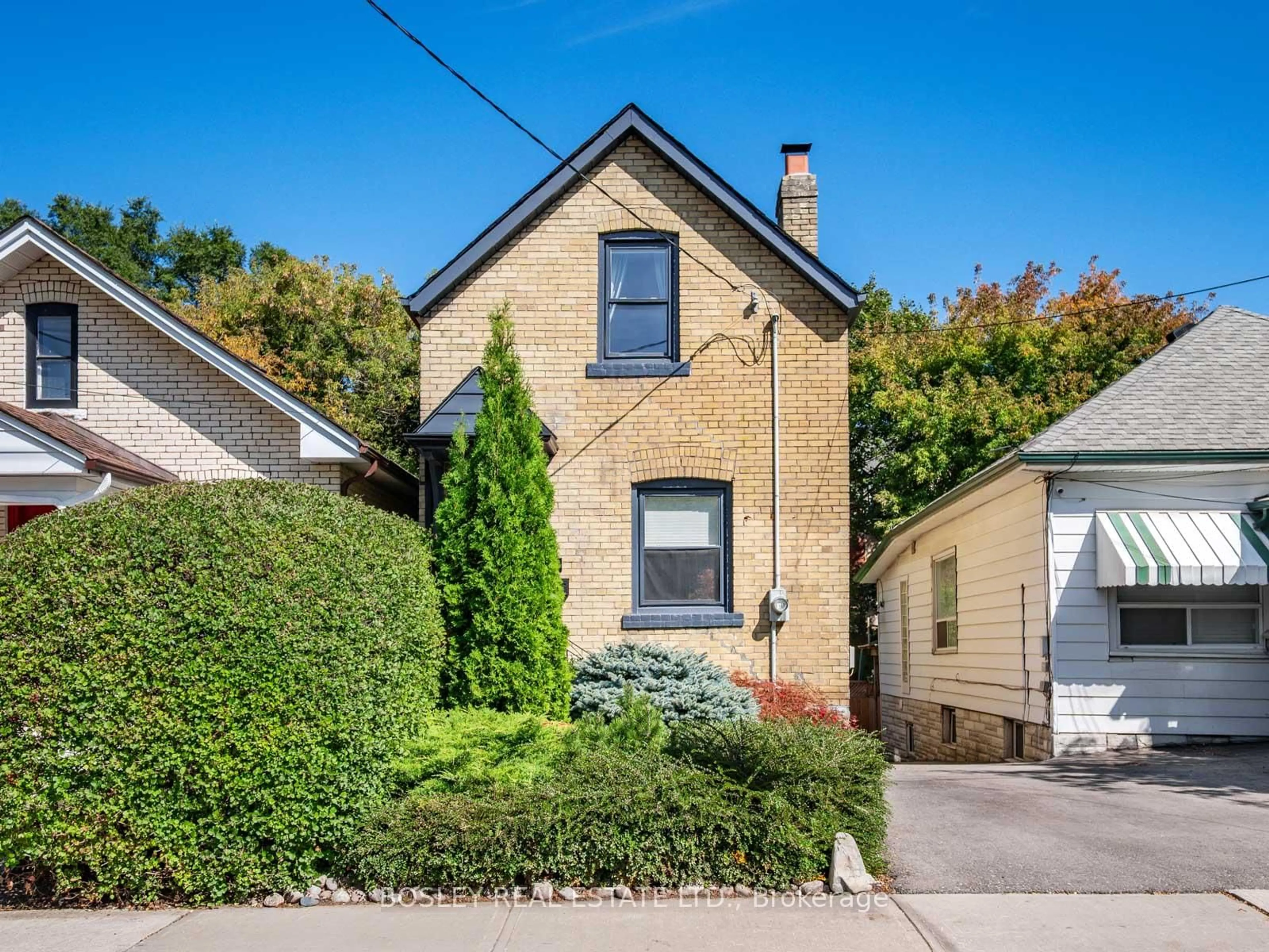 Home with brick exterior material, street for 25 Newman Ave, Toronto Ontario M4C 5A5