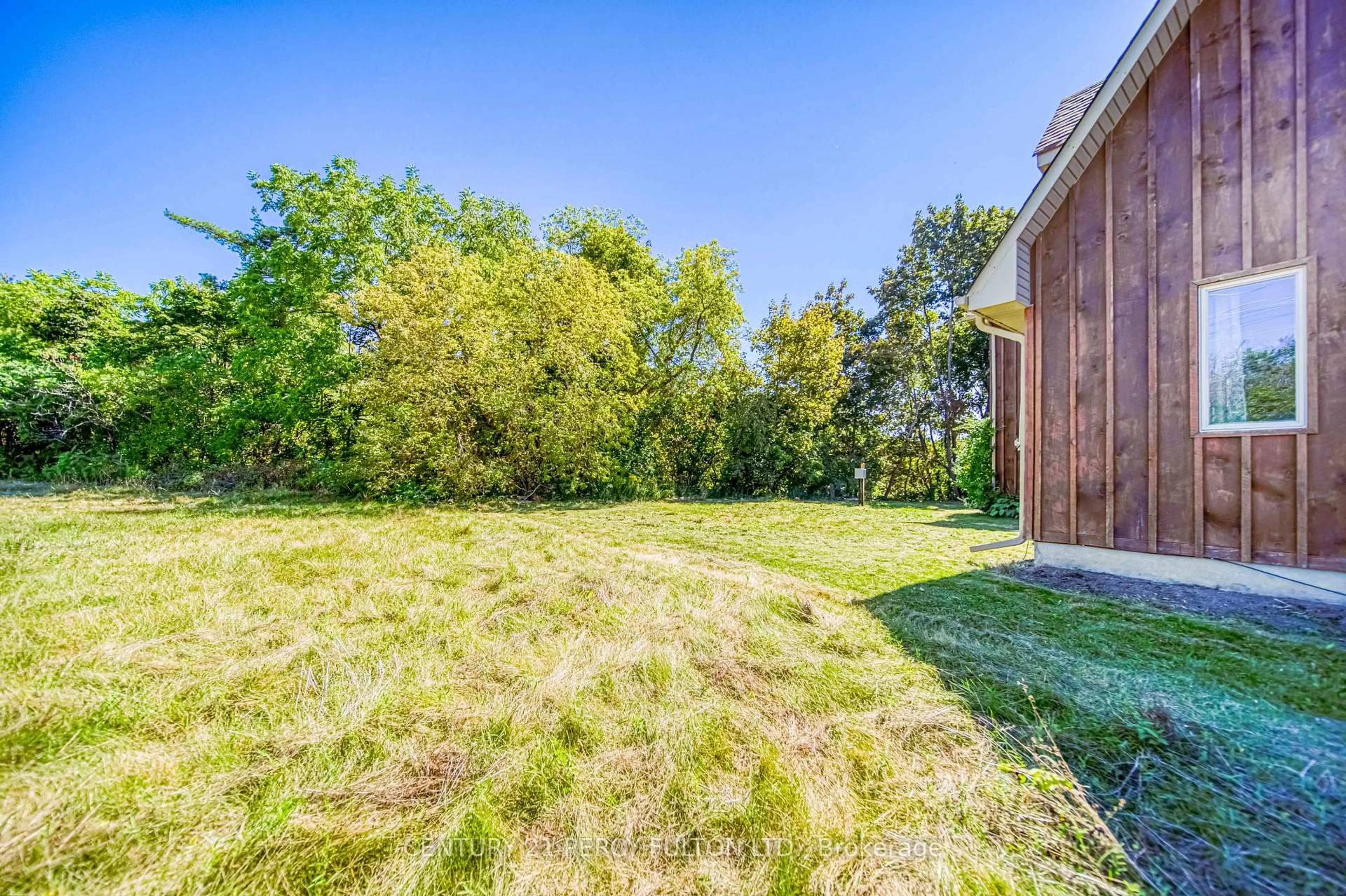 A pic from outside/outdoor area/front of a property/back of a property/a pic from drone, forest/trees view for 925 Harmony Rd, Oshawa Ontario L1K 3E2