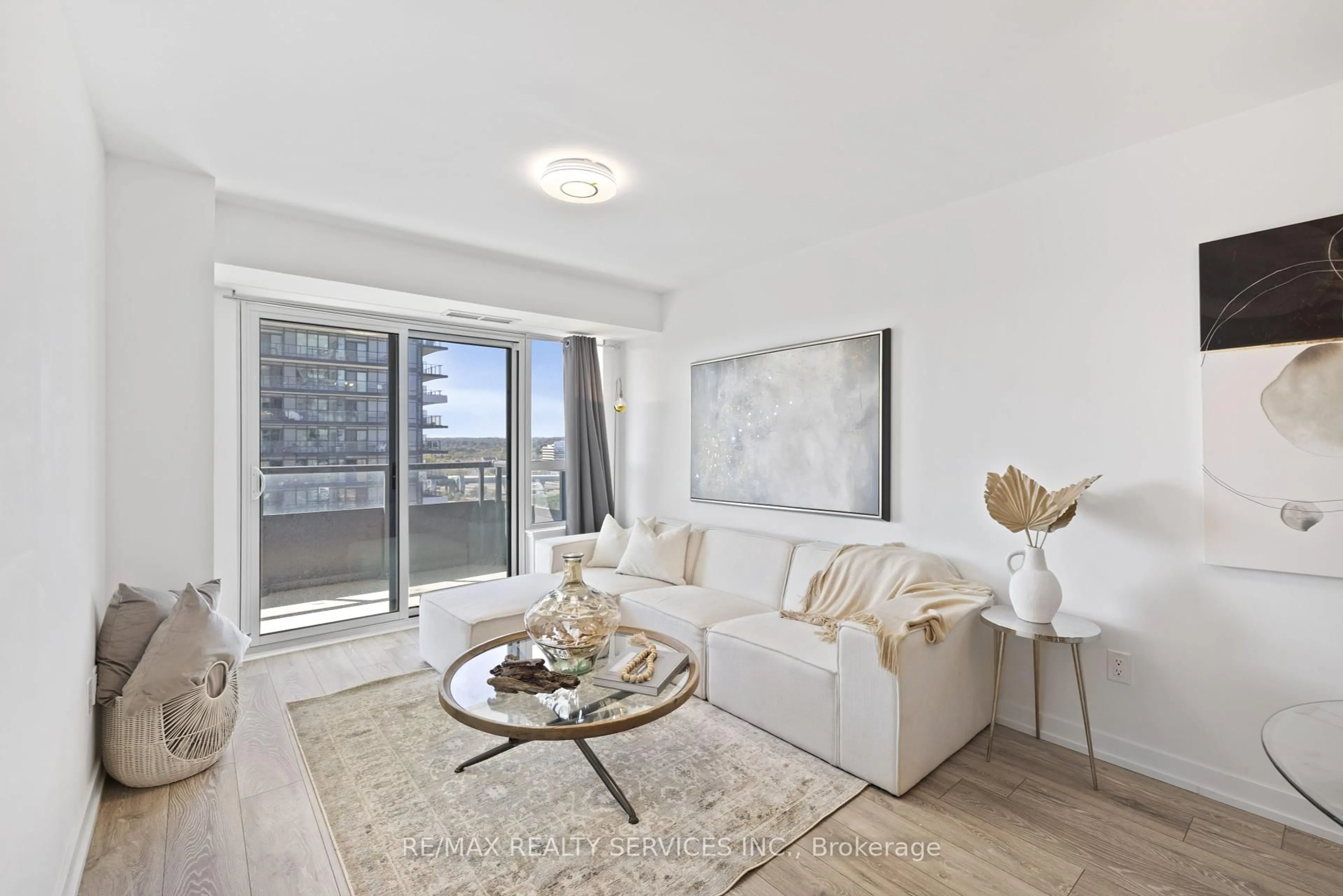 Living room with furniture, wood/laminate floor for 1455 Celebration Dr #1406, Pickering Ontario L1W 0C3