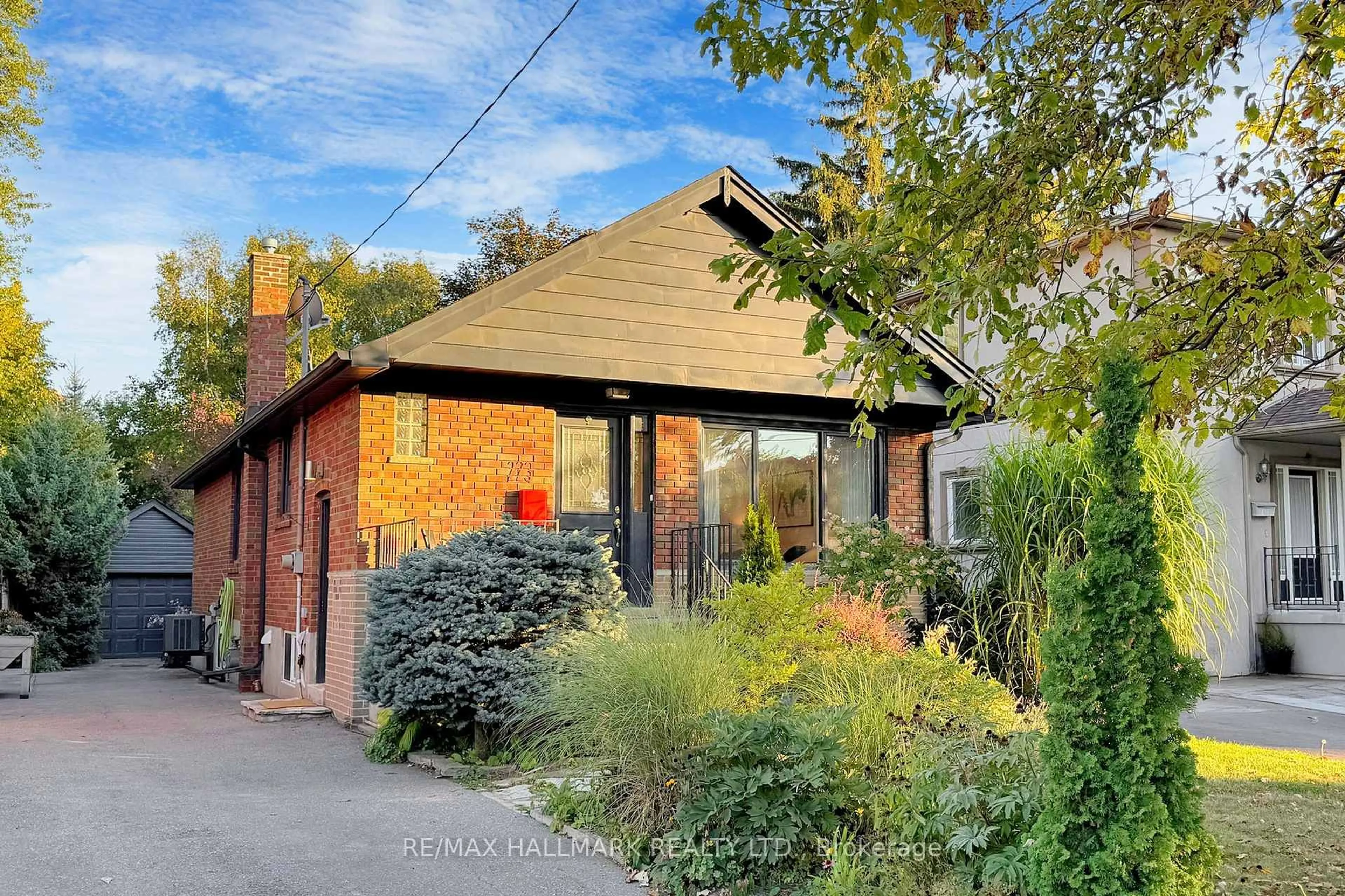 Home with brick exterior material, street for 223 Ferris Rd, Toronto Ontario M4B 1H2