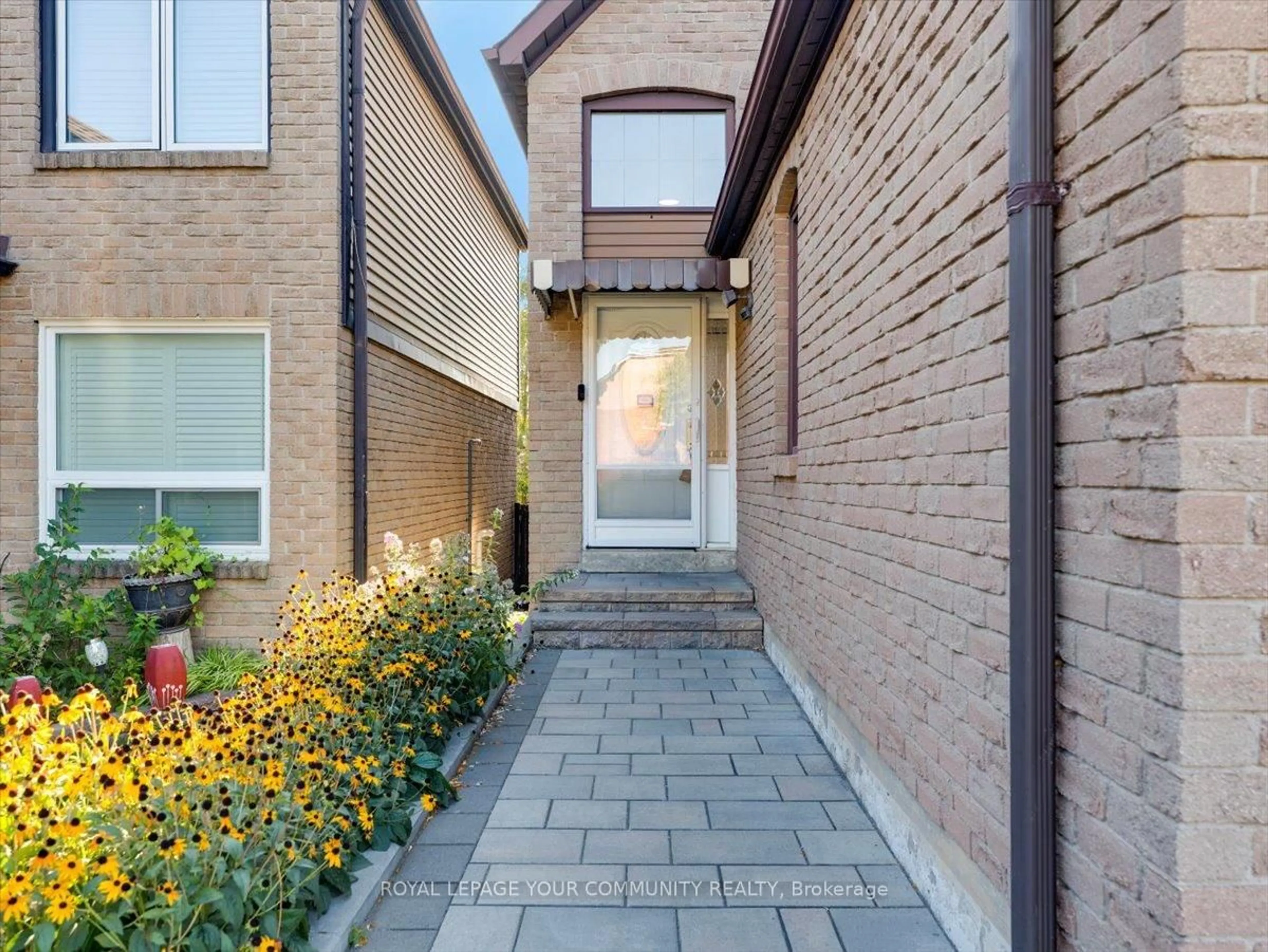 Home with brick exterior material, street for 56 Ecclesfield Dr, Toronto Ontario M1W 3J6