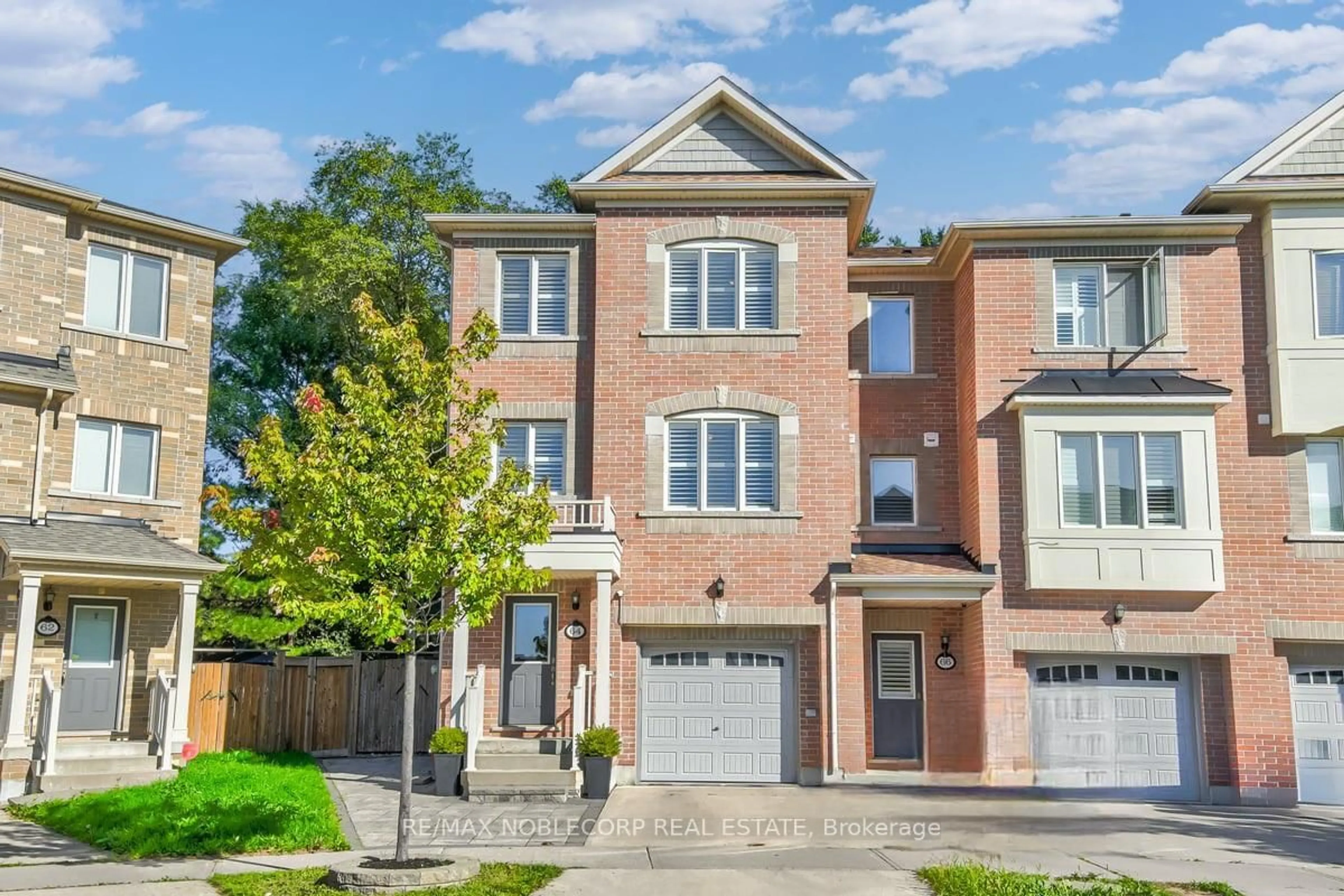 Home with brick exterior material, street for 64 Pringdale Gardens Circ, Toronto Ontario M1J 0B1