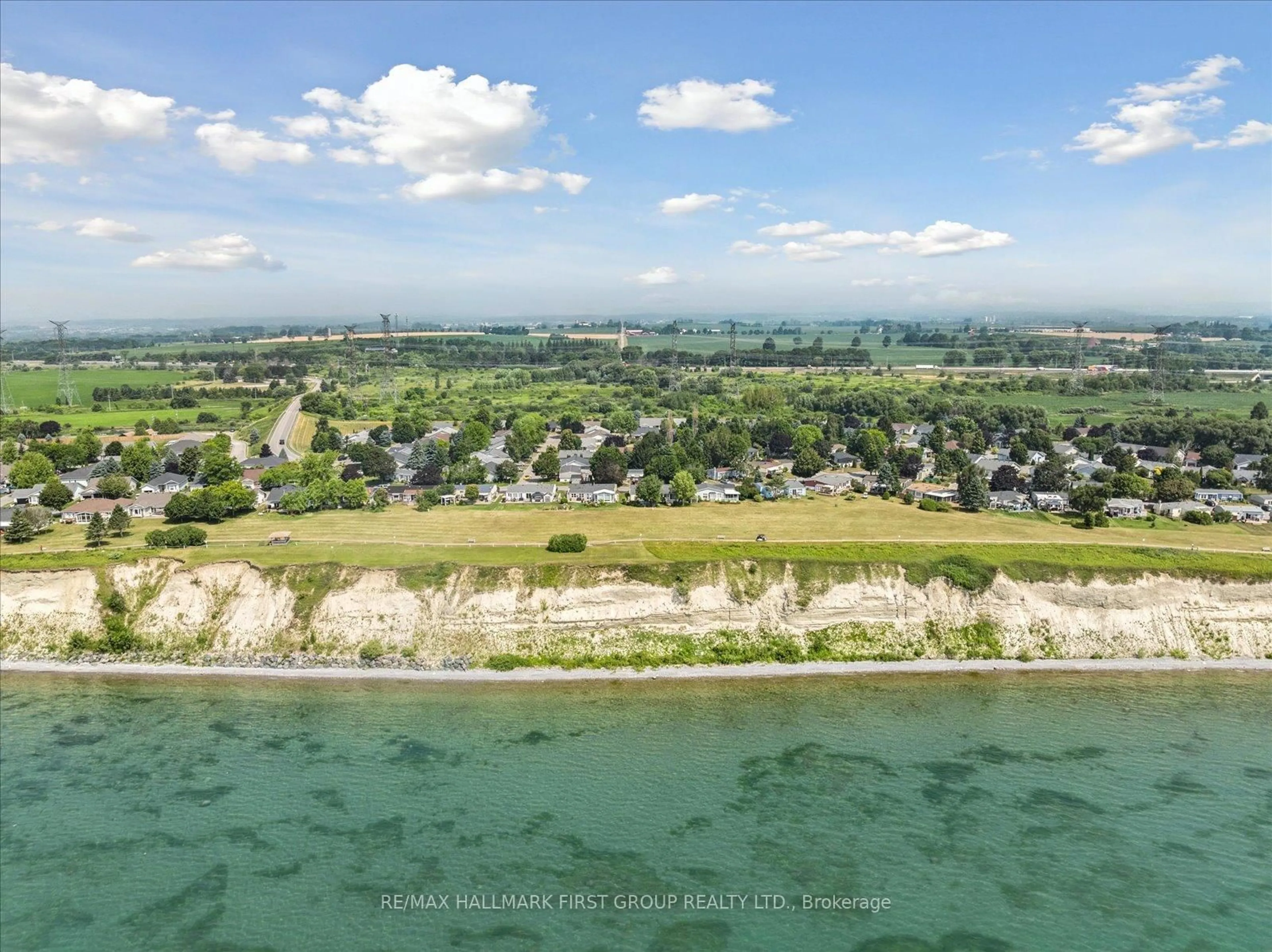 A pic from outside/outdoor area/front of a property/back of a property/a pic from drone, water/lake/river/ocean view for 27 Wilmot Tr, Clarington Ontario L1B 1A1