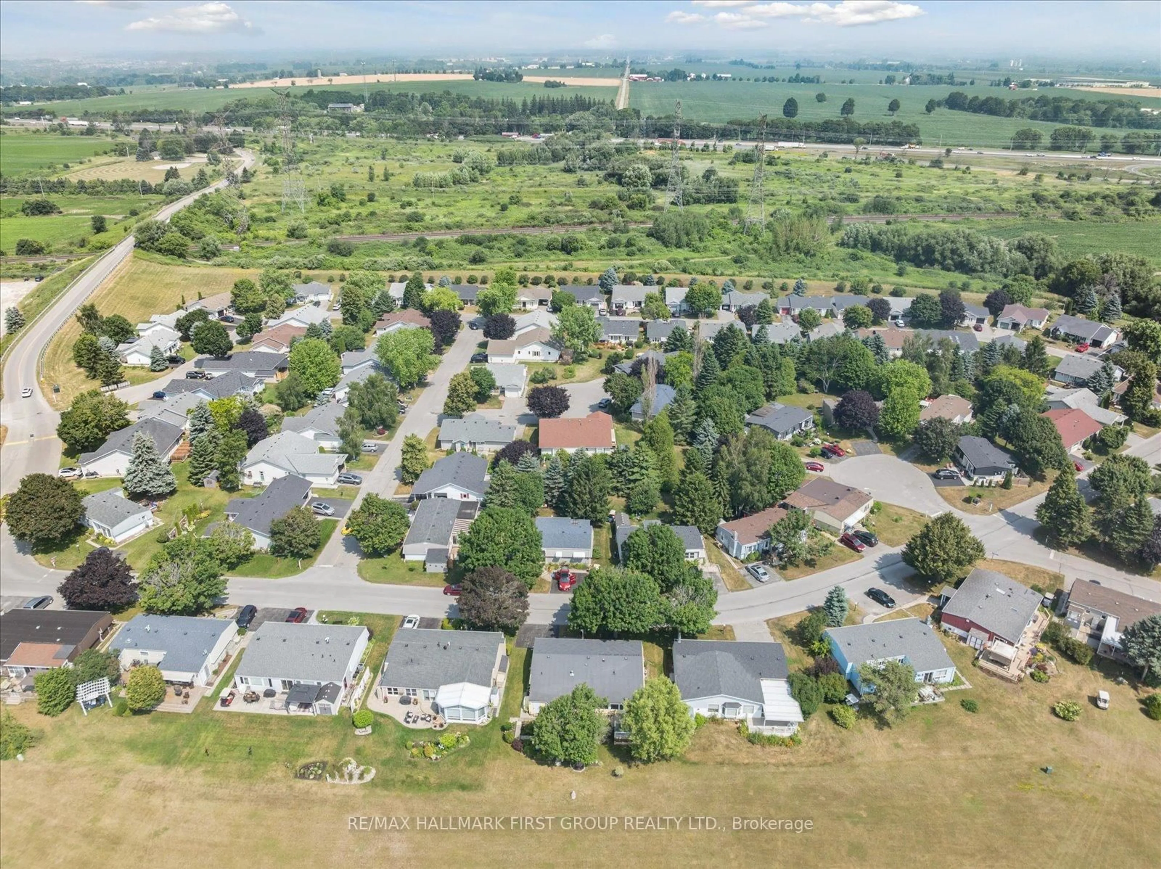 A pic from outside/outdoor area/front of a property/back of a property/a pic from drone, mountain view for 27 Wilmot Tr, Clarington Ontario L1B 1A1