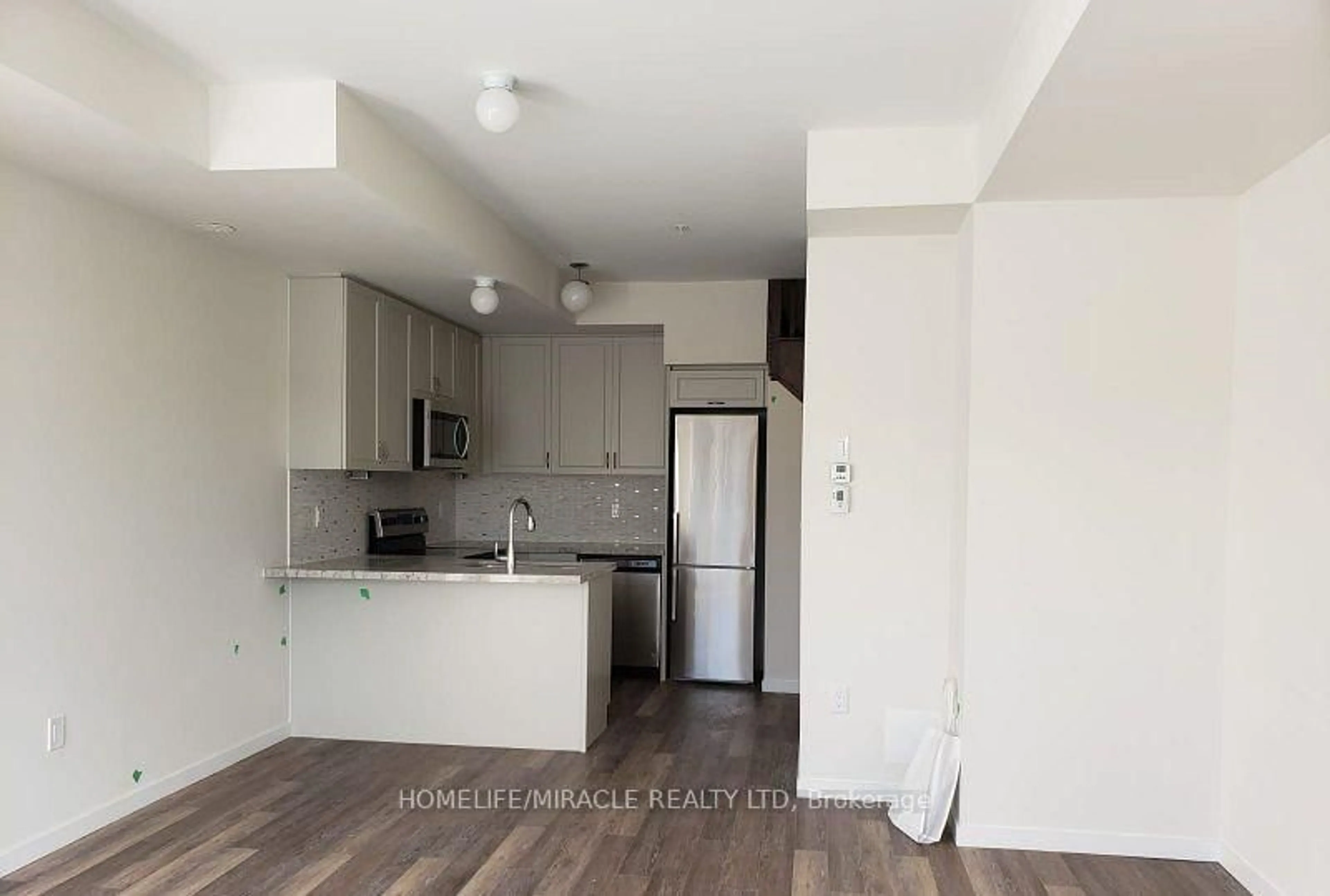 Open concept kitchen, unknown for 1711 Pure Springs Blvd #104, Pickering Ontario L1X 0E3
