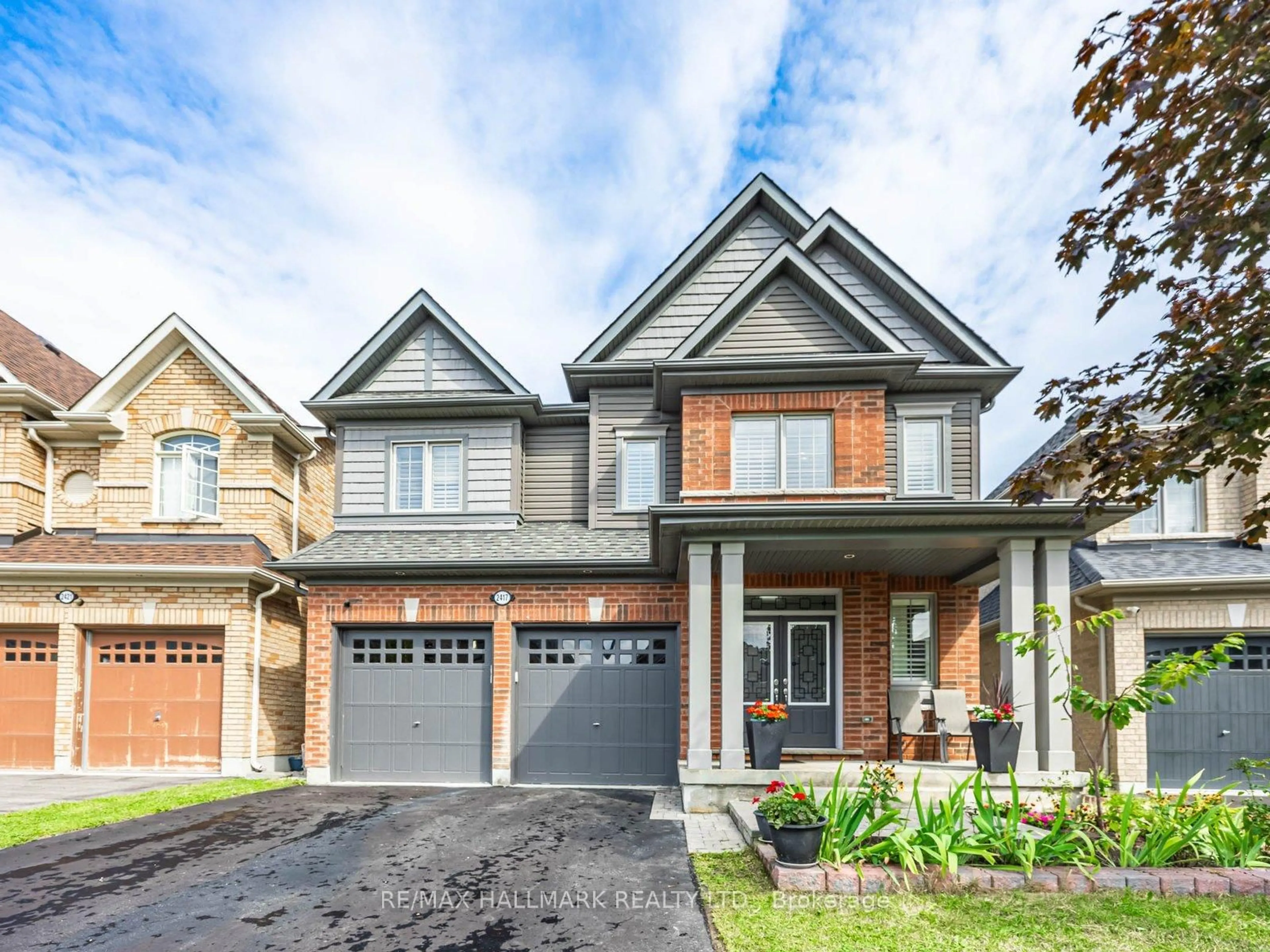 Home with brick exterior material, street for 2417 Secreto Dr, Oshawa Ontario L1L 0H6