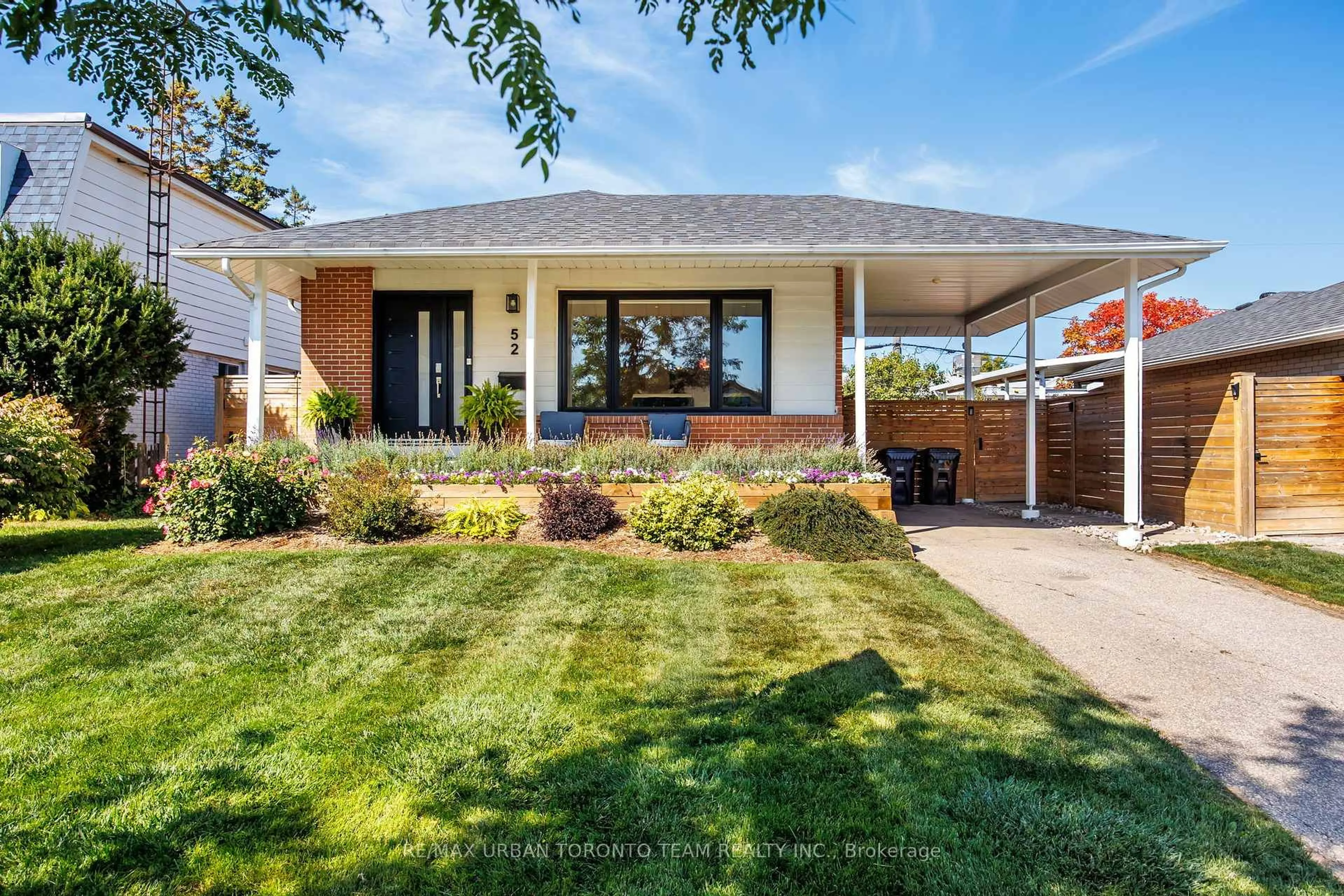 Home with brick exterior material, street for 52 Earswick Dr, Toronto Ontario M1E 1C6