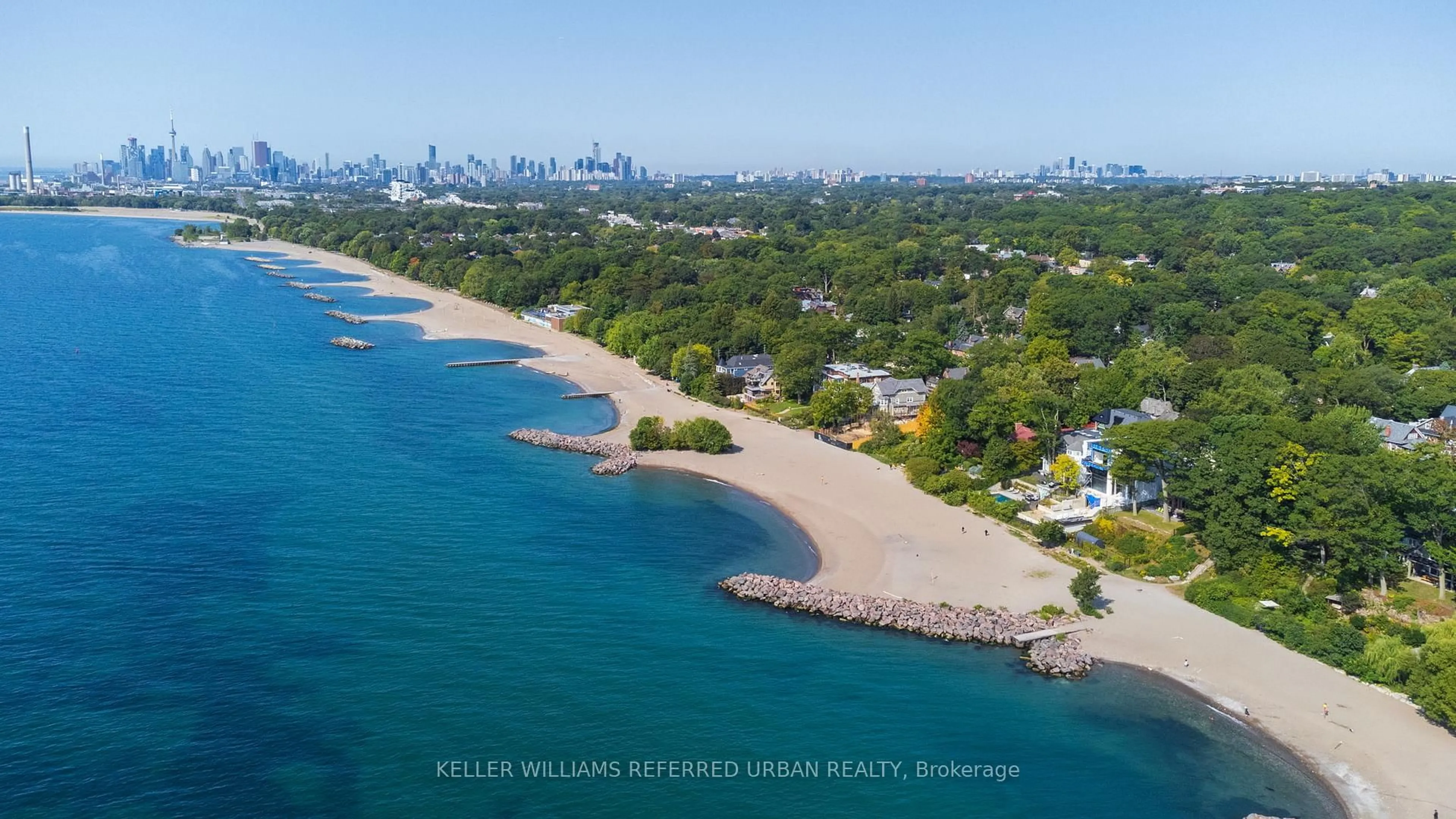 A pic from outside/outdoor area/front of a property/back of a property/a pic from drone, water/lake/river/ocean view for 122 Neville Park Blvd, Toronto Ontario M4E 3P8