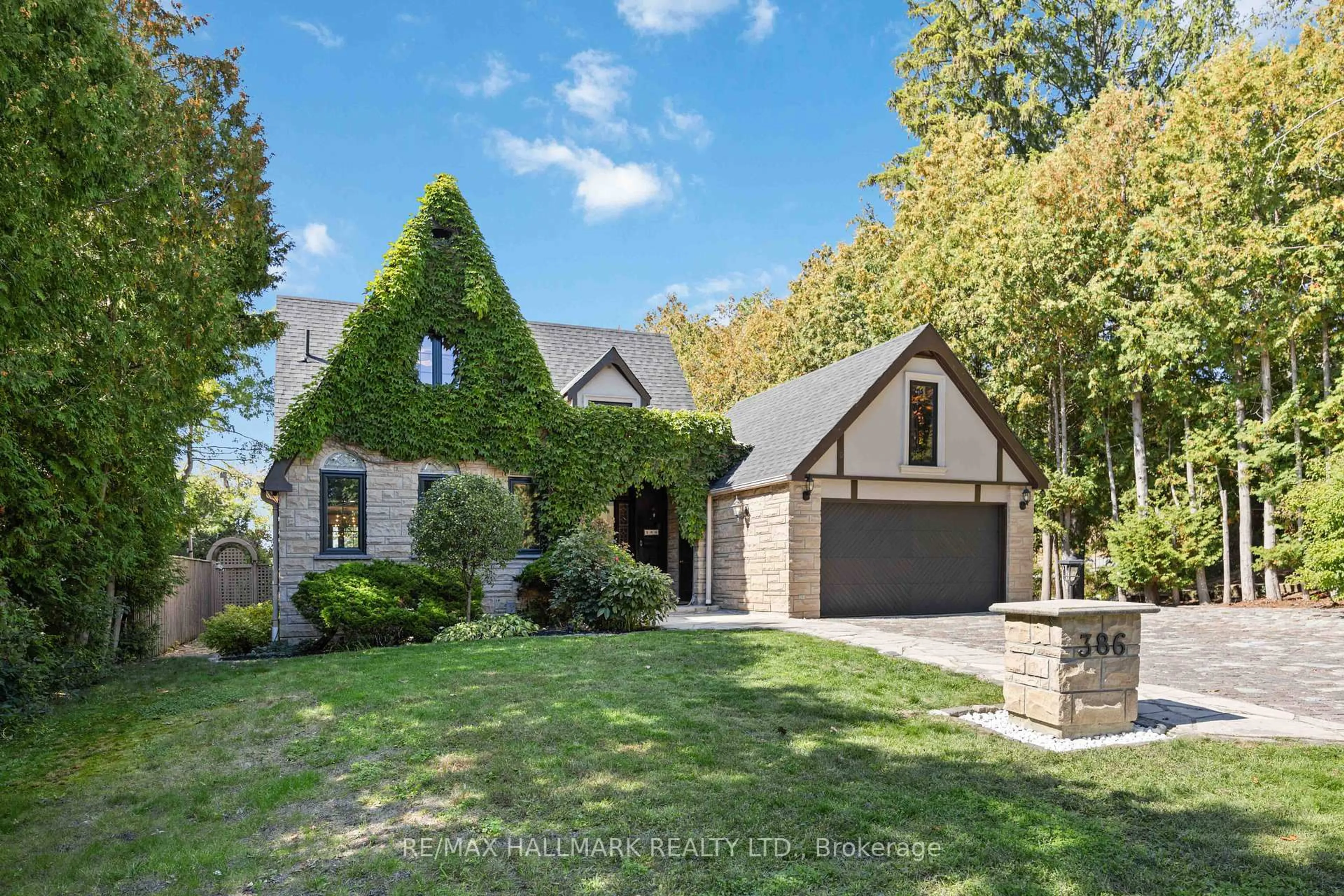 Home with brick exterior material, street for 386 Woodgrange Ave, Pickering Ontario L1W 2B3