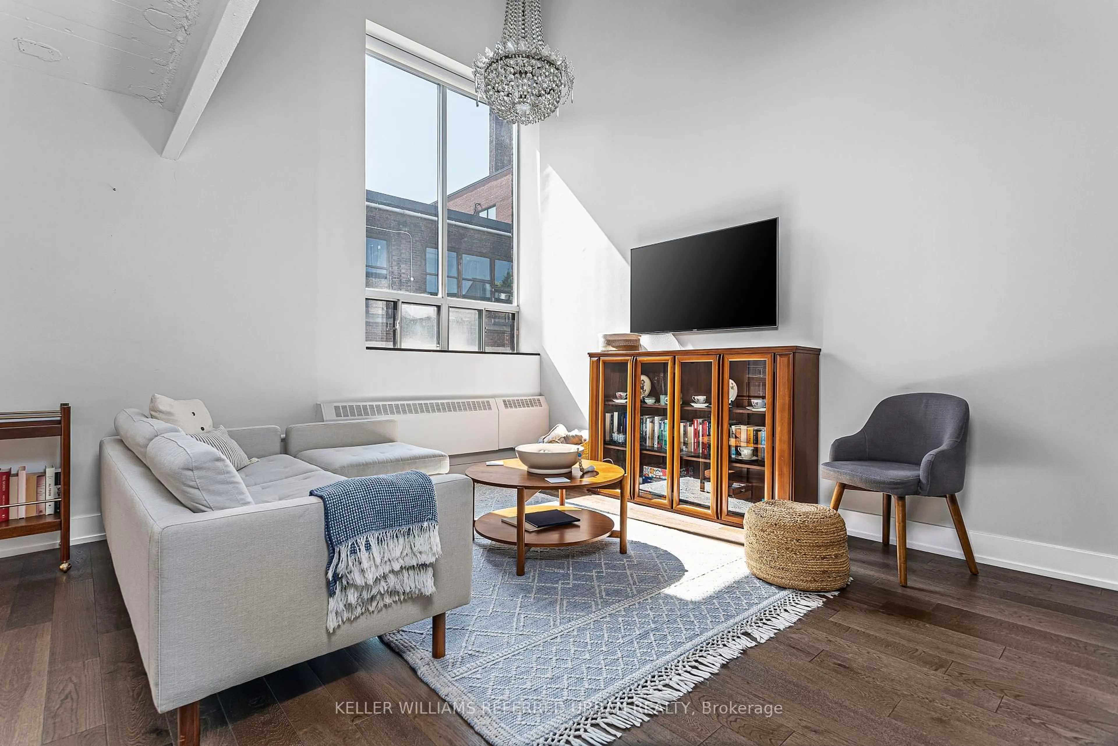 Living room with furniture, unknown for 326 Carlaw Ave #106, Toronto Ontario M4M 3N8