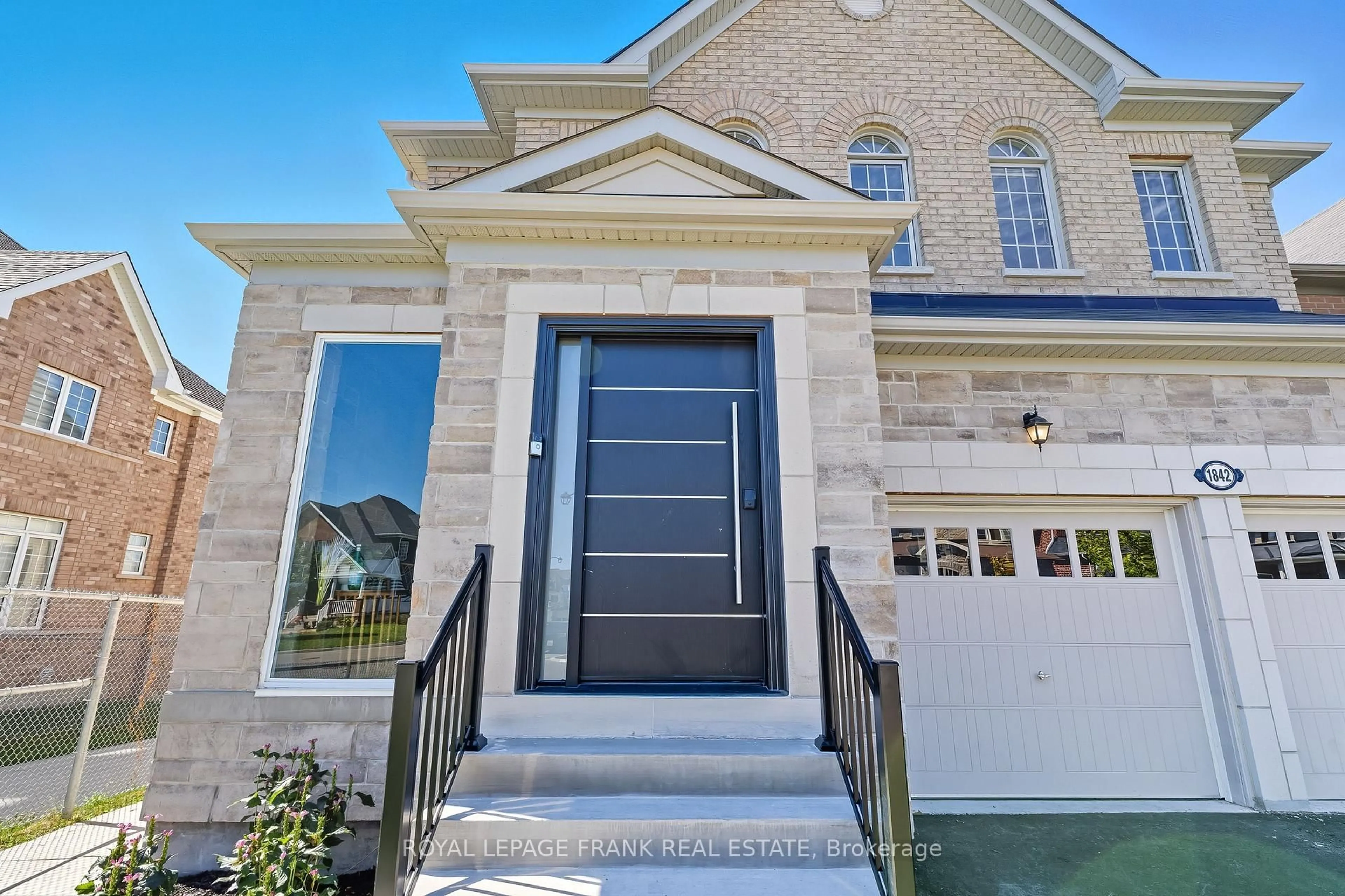 Home with brick exterior material, street for 1842 Douglas Langtree Dr, Oshawa Ontario L1K 0Y5