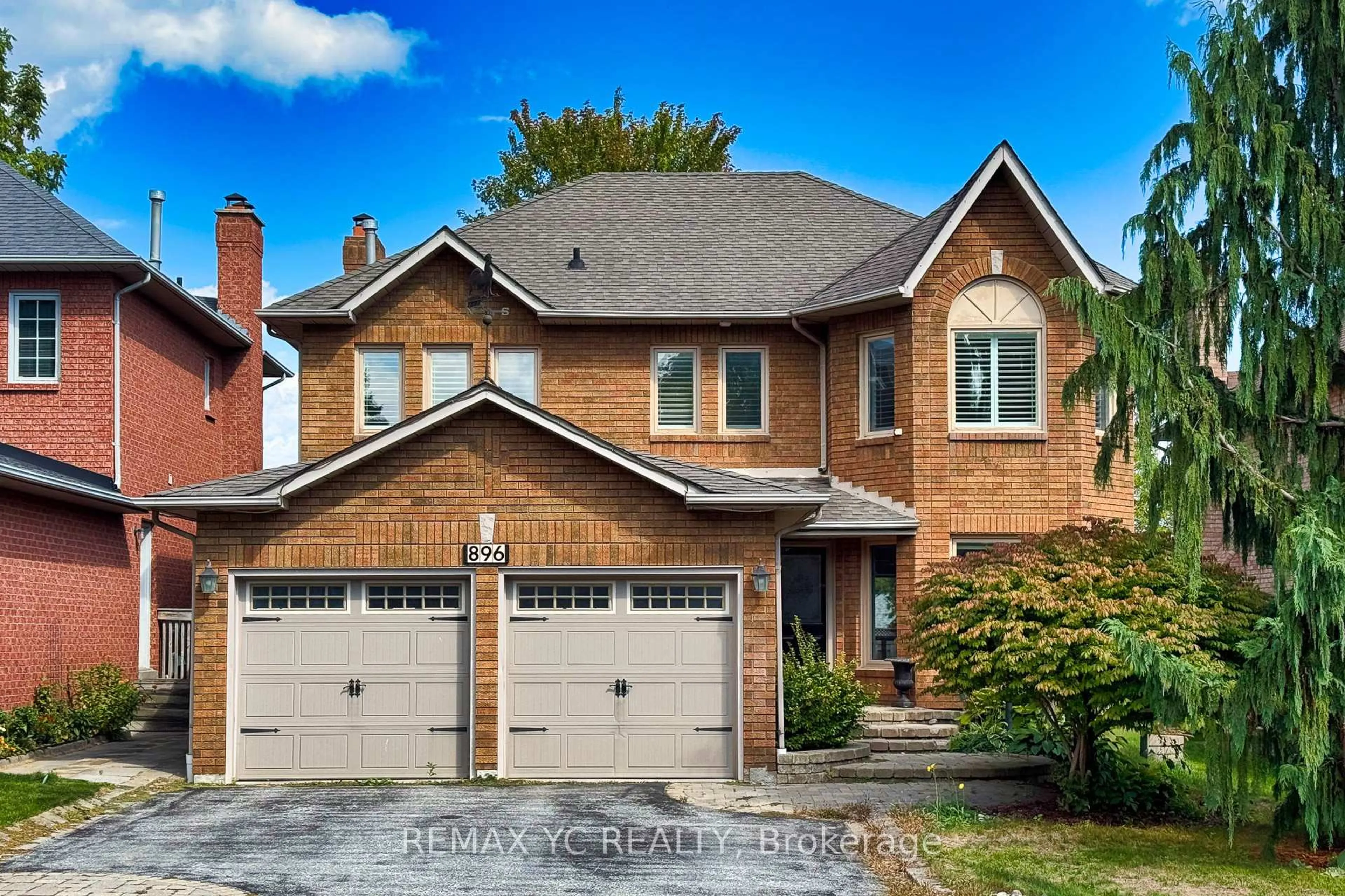 Home with brick exterior material, street for 896 Darwin Dr, Pickering Ontario L1X 2P8