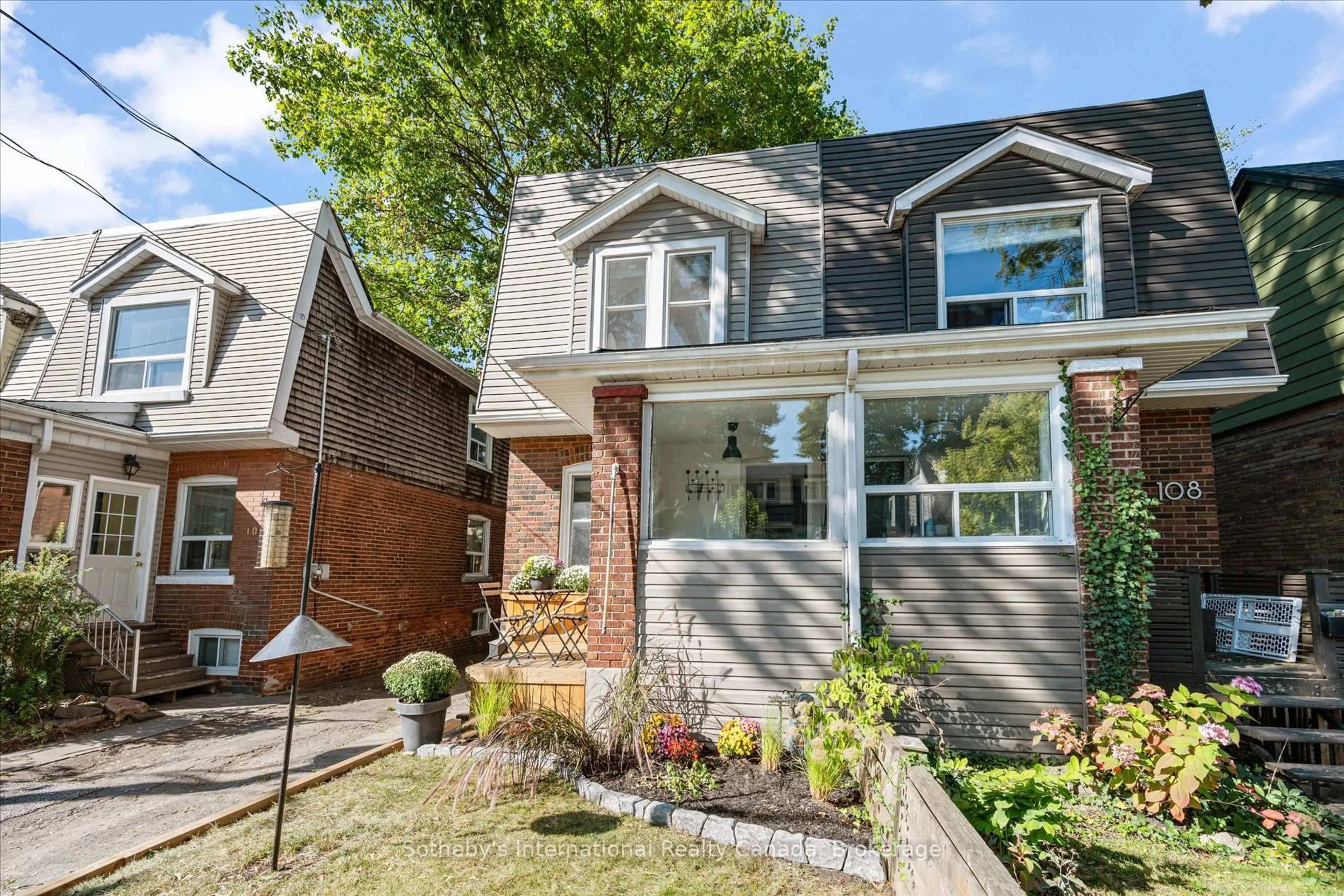 Home with brick exterior material, street for 106 Hiltz Ave, Toronto Ontario M4L 2N5