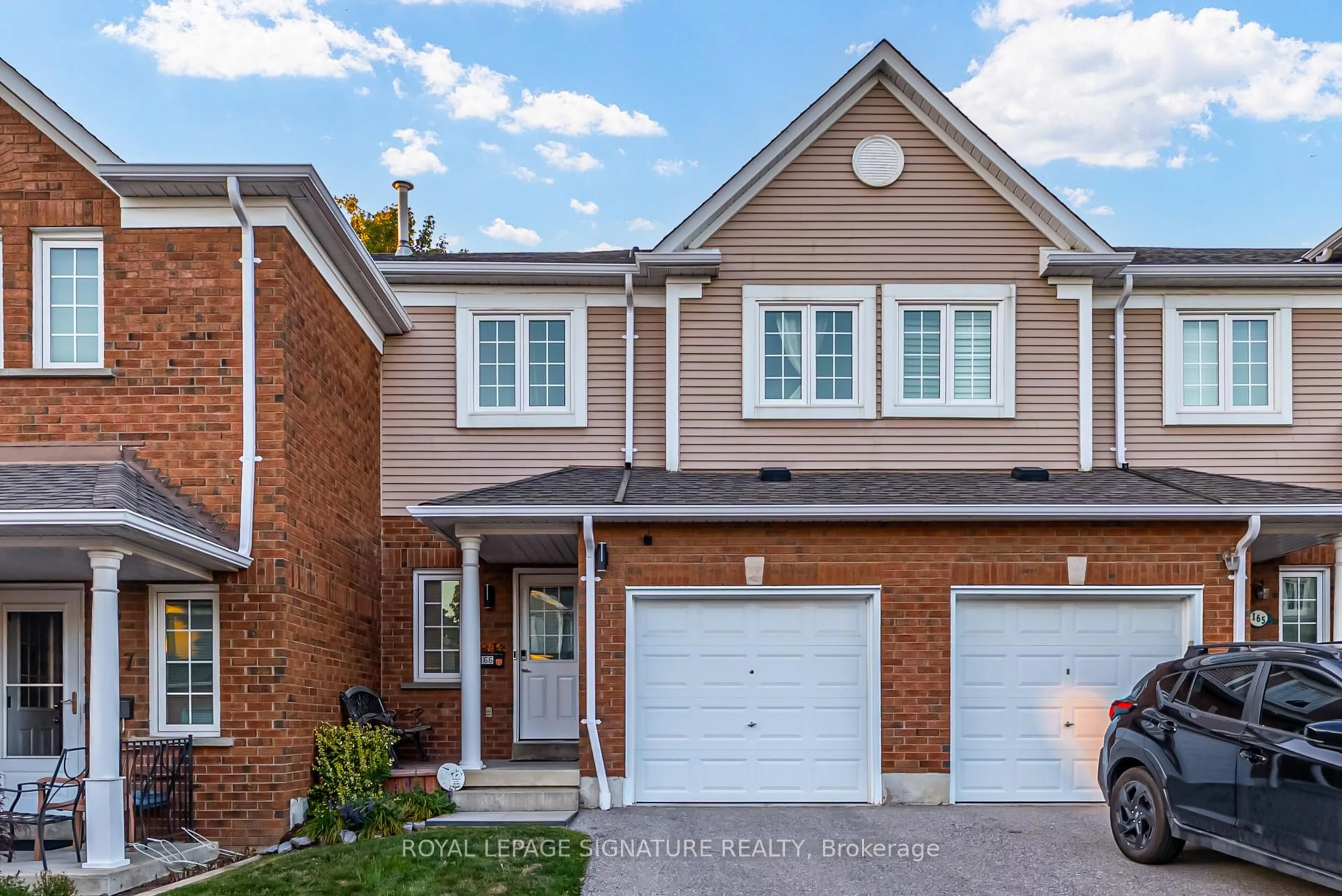 Home with brick exterior material, street for 10 Bassett Blvd #166, Whitby Ontario L1N 9C7