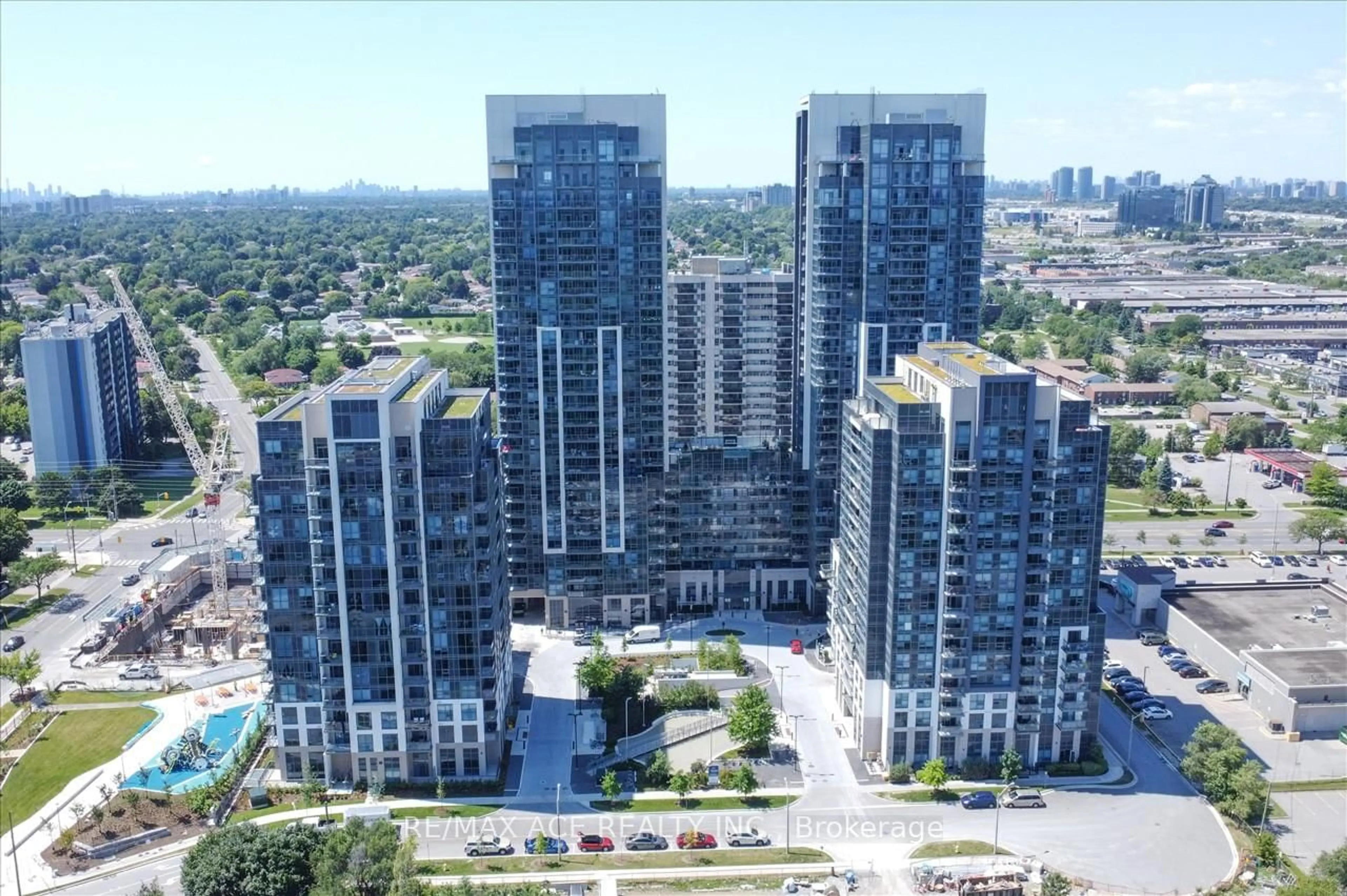 A pic from outside/outdoor area/front of a property/back of a property/a pic from drone, city buildings view from balcony for 30 Meadowglen Pl #411, Toronto Ontario M1G 0A6