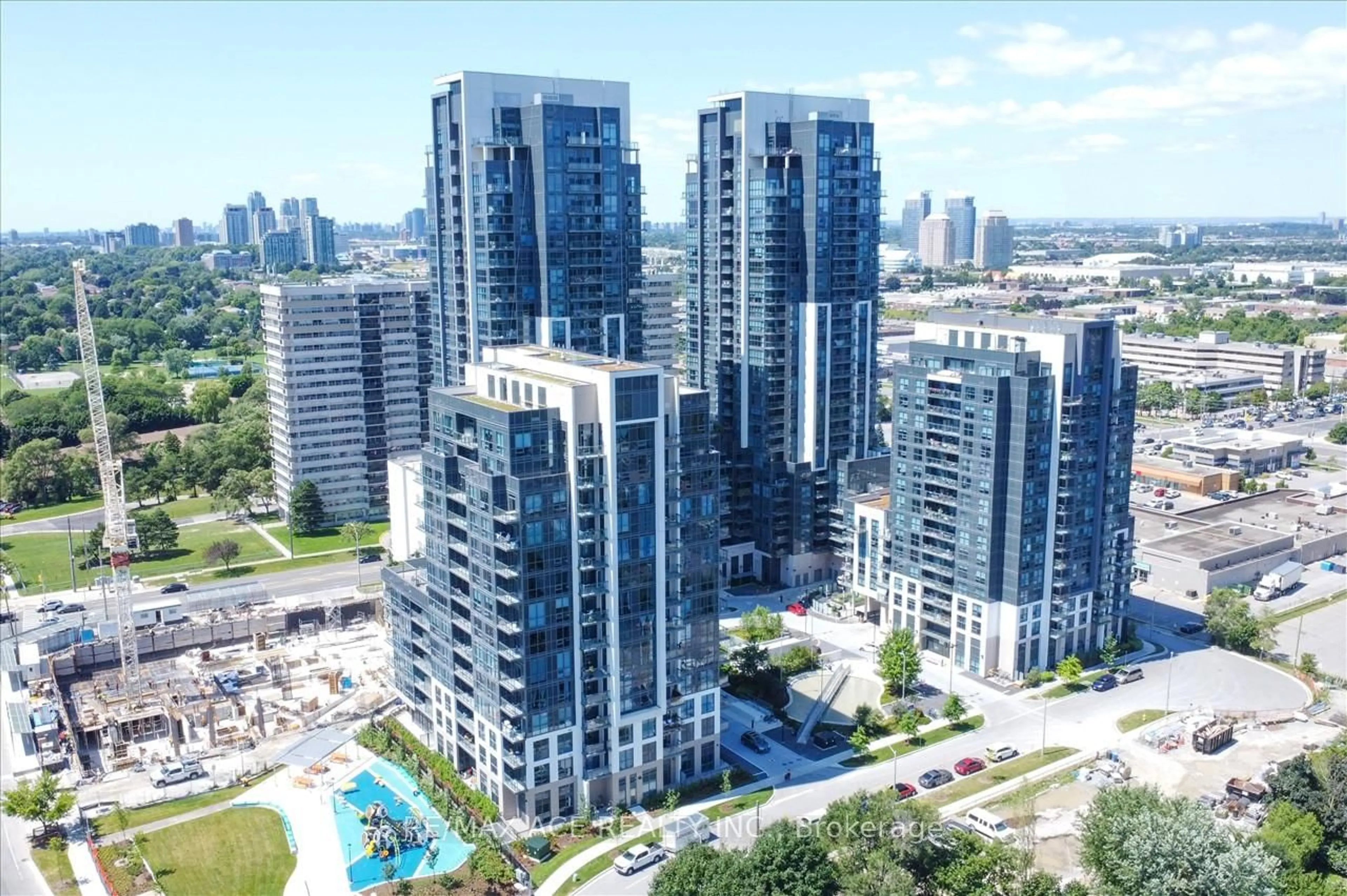 A pic from outside/outdoor area/front of a property/back of a property/a pic from drone, city buildings view from balcony for 30 Meadowglen Pl #411, Toronto Ontario M1G 0A6