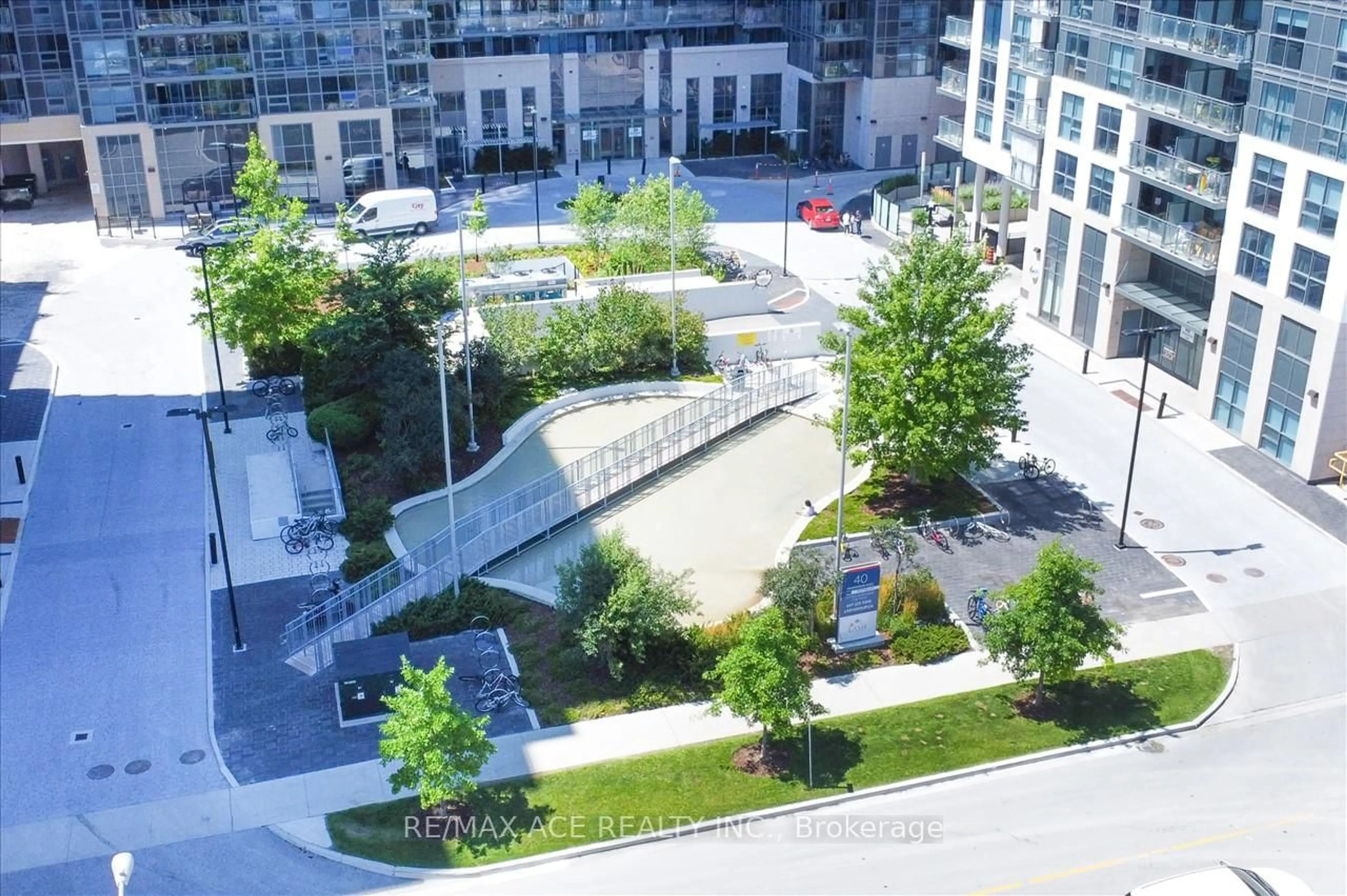 A pic from outside/outdoor area/front of a property/back of a property/a pic from drone, city buildings view from balcony for 30 Meadowglen Pl #411, Toronto Ontario M1G 0A6
