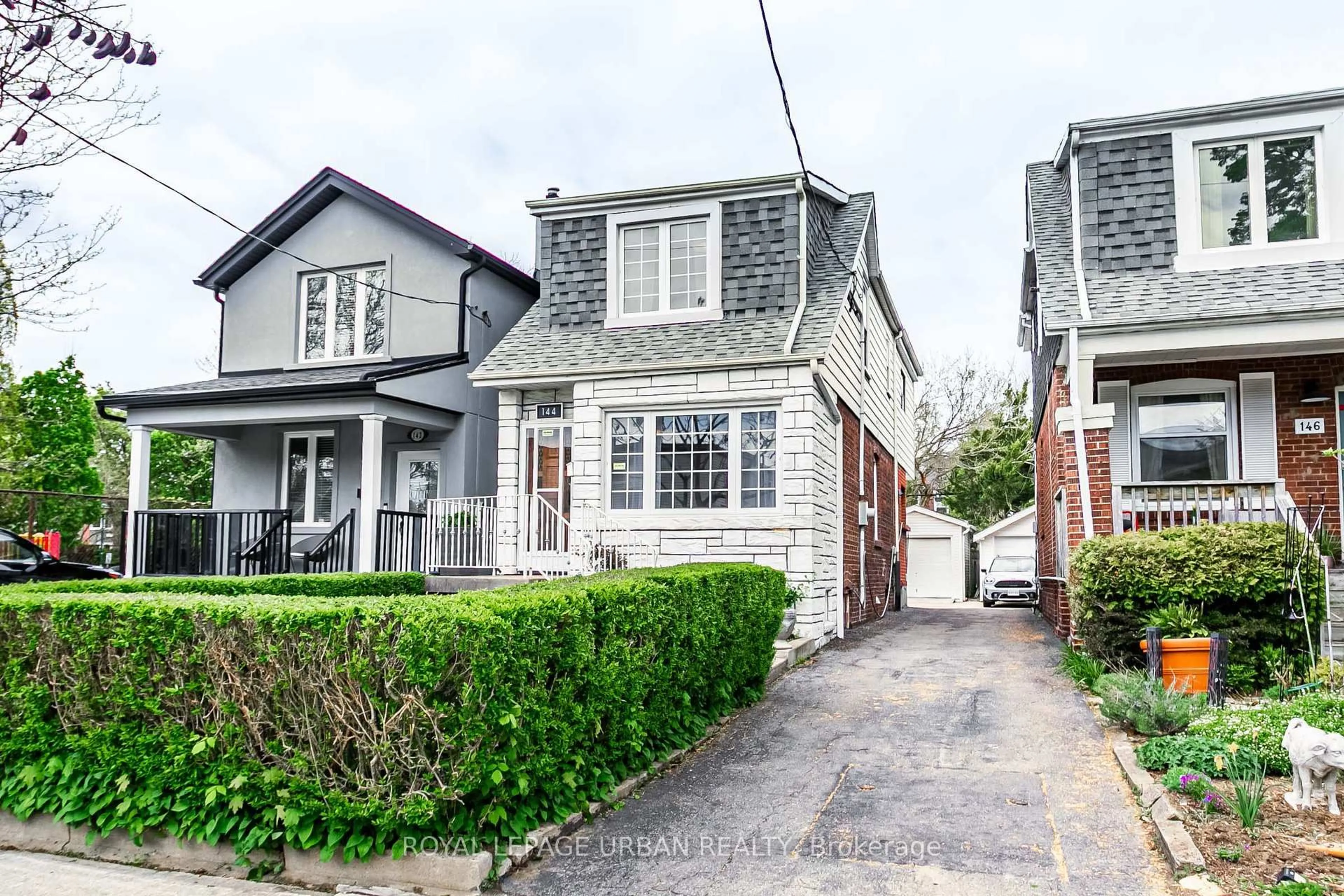Home with brick exterior material, street for 144 Aldwych Ave, Toronto Ontario M4J 1X6