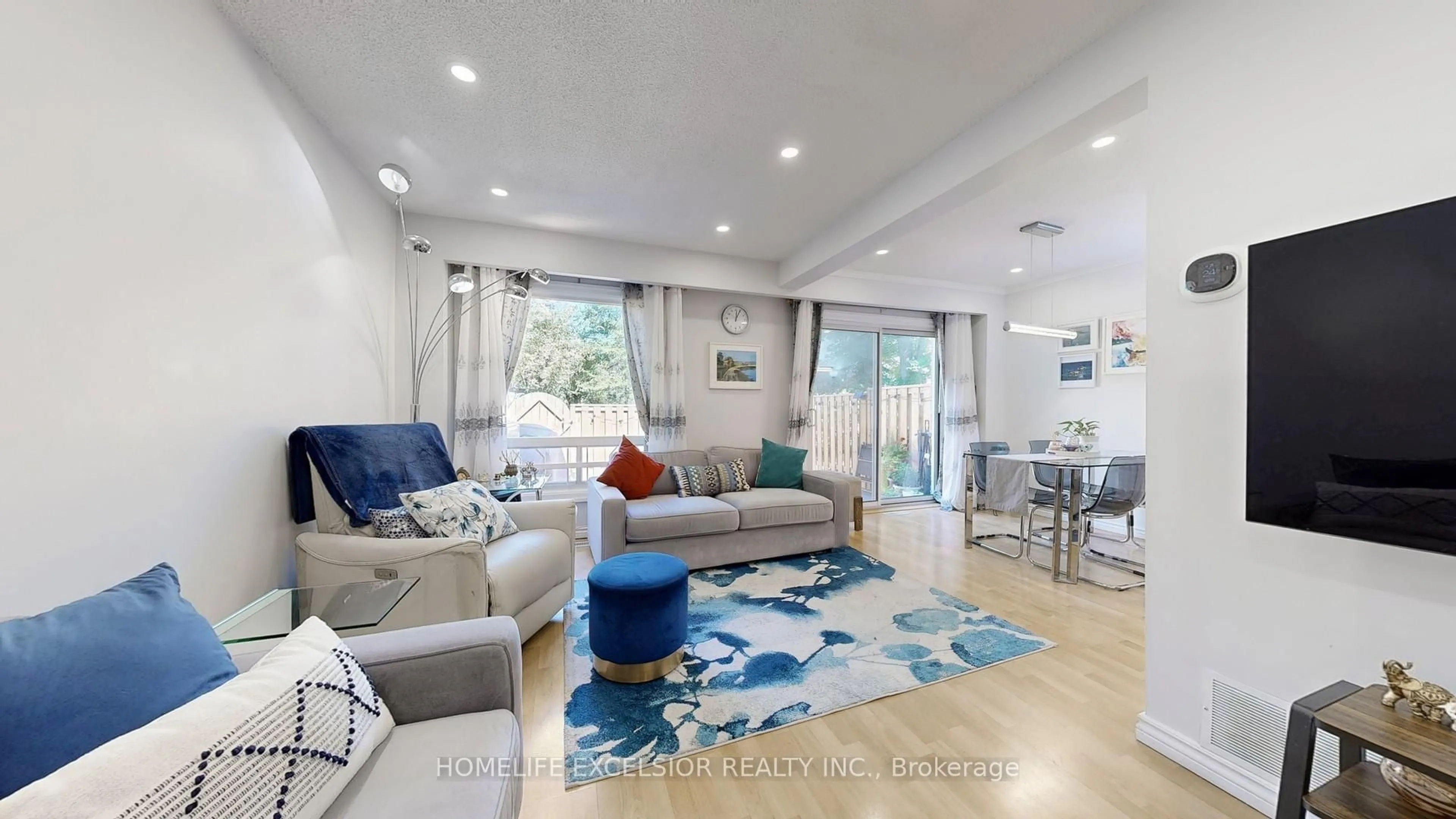 Living room with furniture, unknown for 201 Alexmuir Blvd ##73, Toronto Ontario M1V 1S5