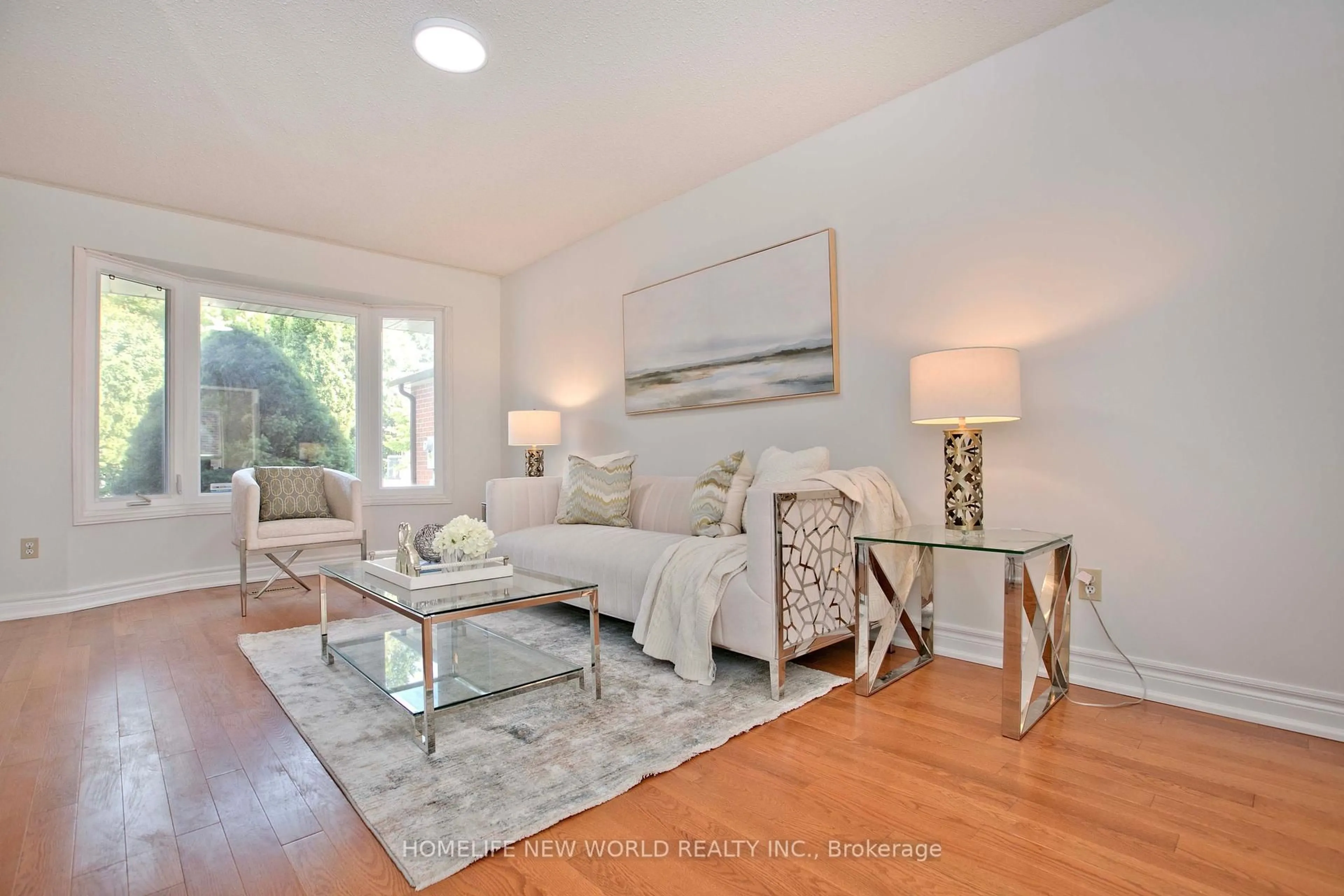 Living room with furniture, wood/laminate floor for 53 Sanwood Blvd, Toronto Ontario M1V 3L6