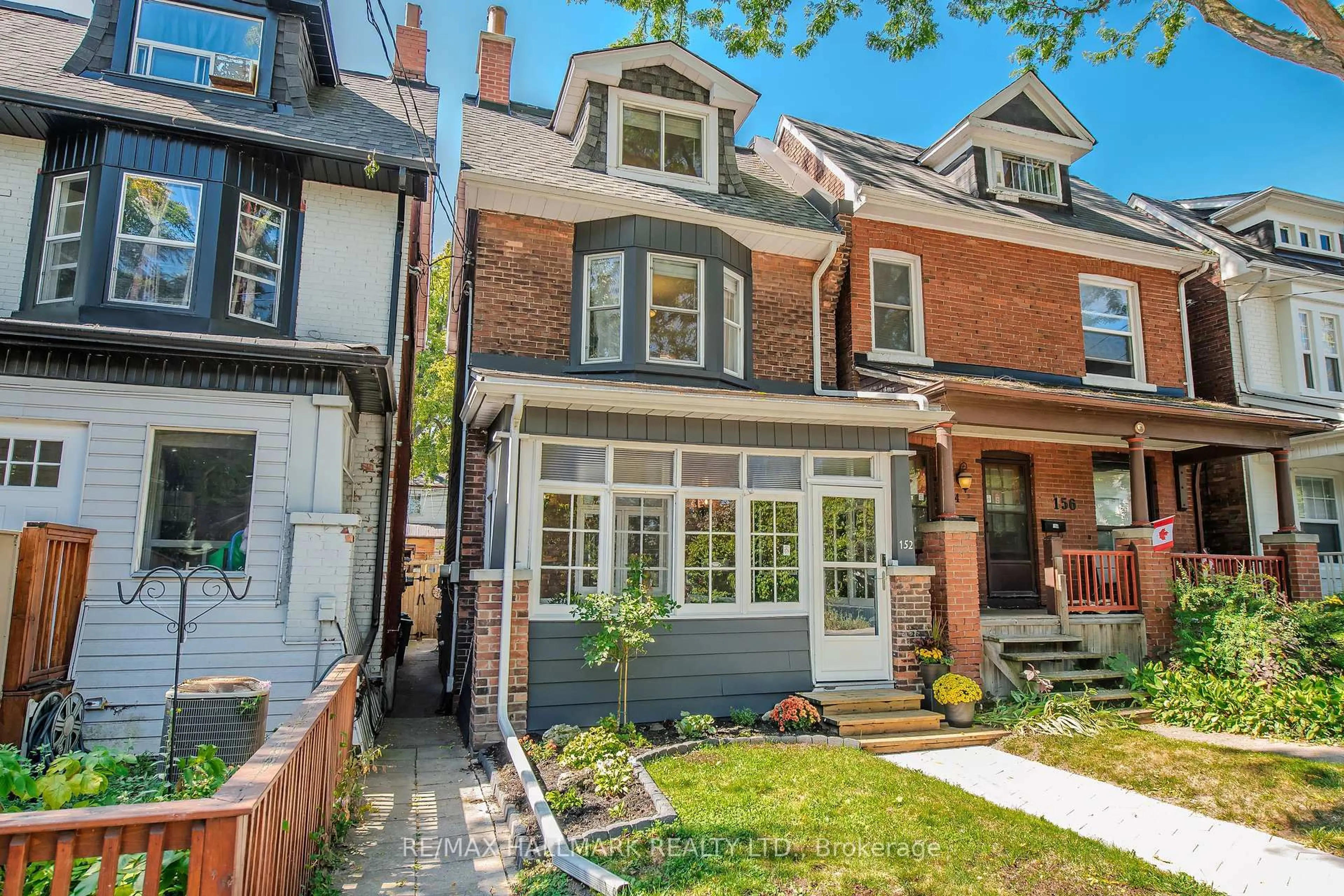 Home with brick exterior material, street for 152 Hastings Ave, Toronto Ontario M4L 2L3