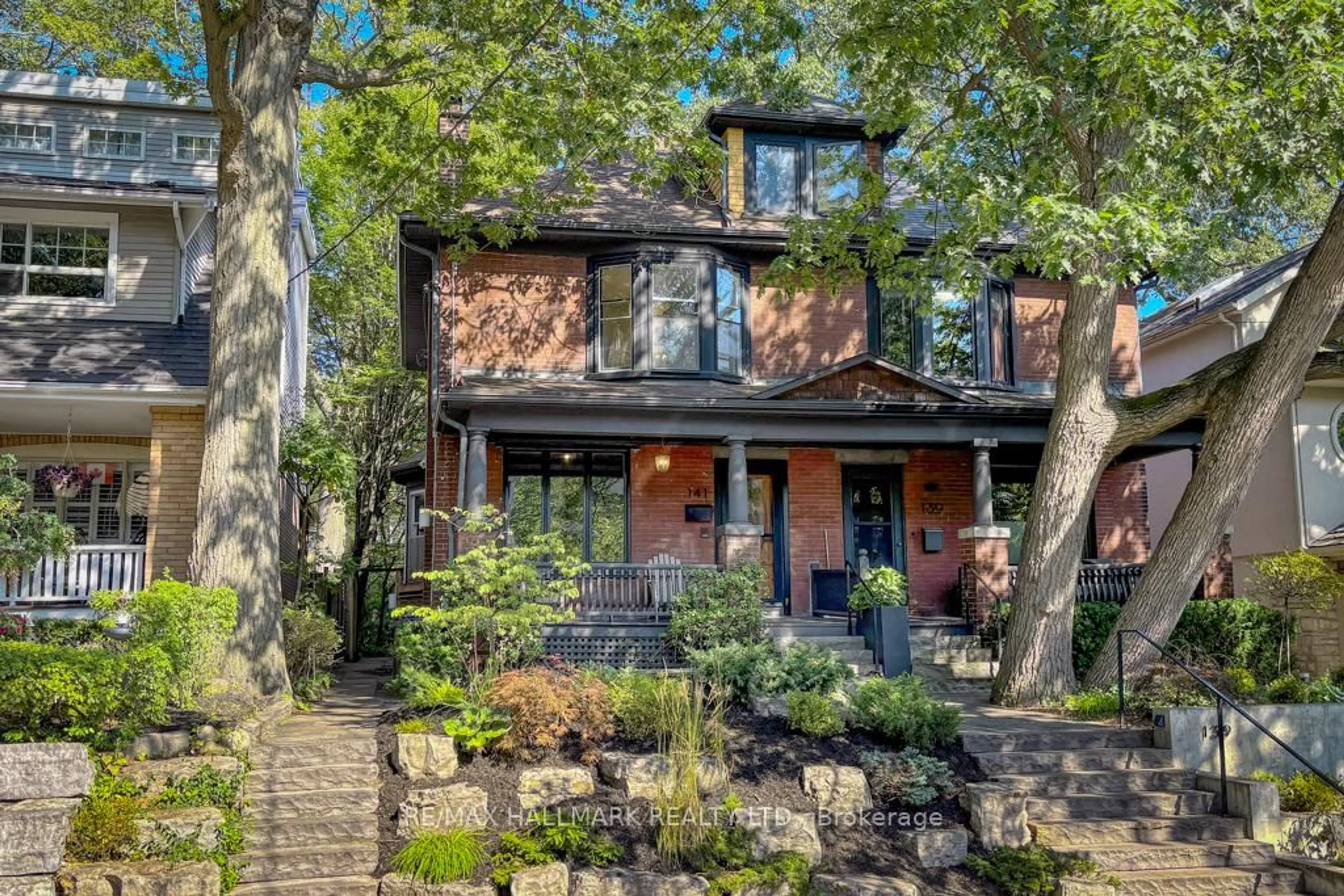 Home with brick exterior material, street for 141 Willow Ave, Toronto Ontario M4E 3K4