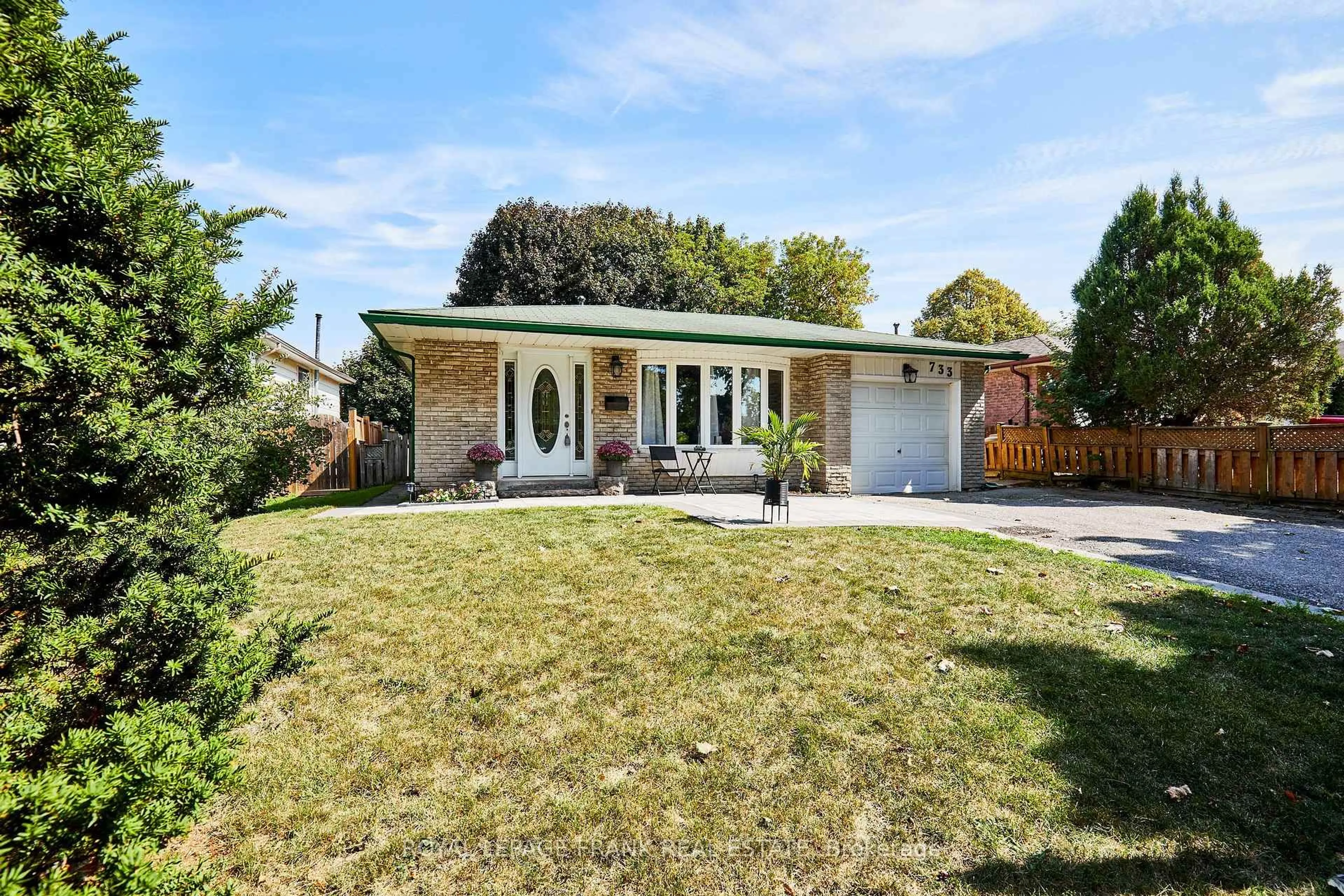 Home with brick exterior material, street for 733 Clifton Dr, Oshawa Ontario L1G 2Y9