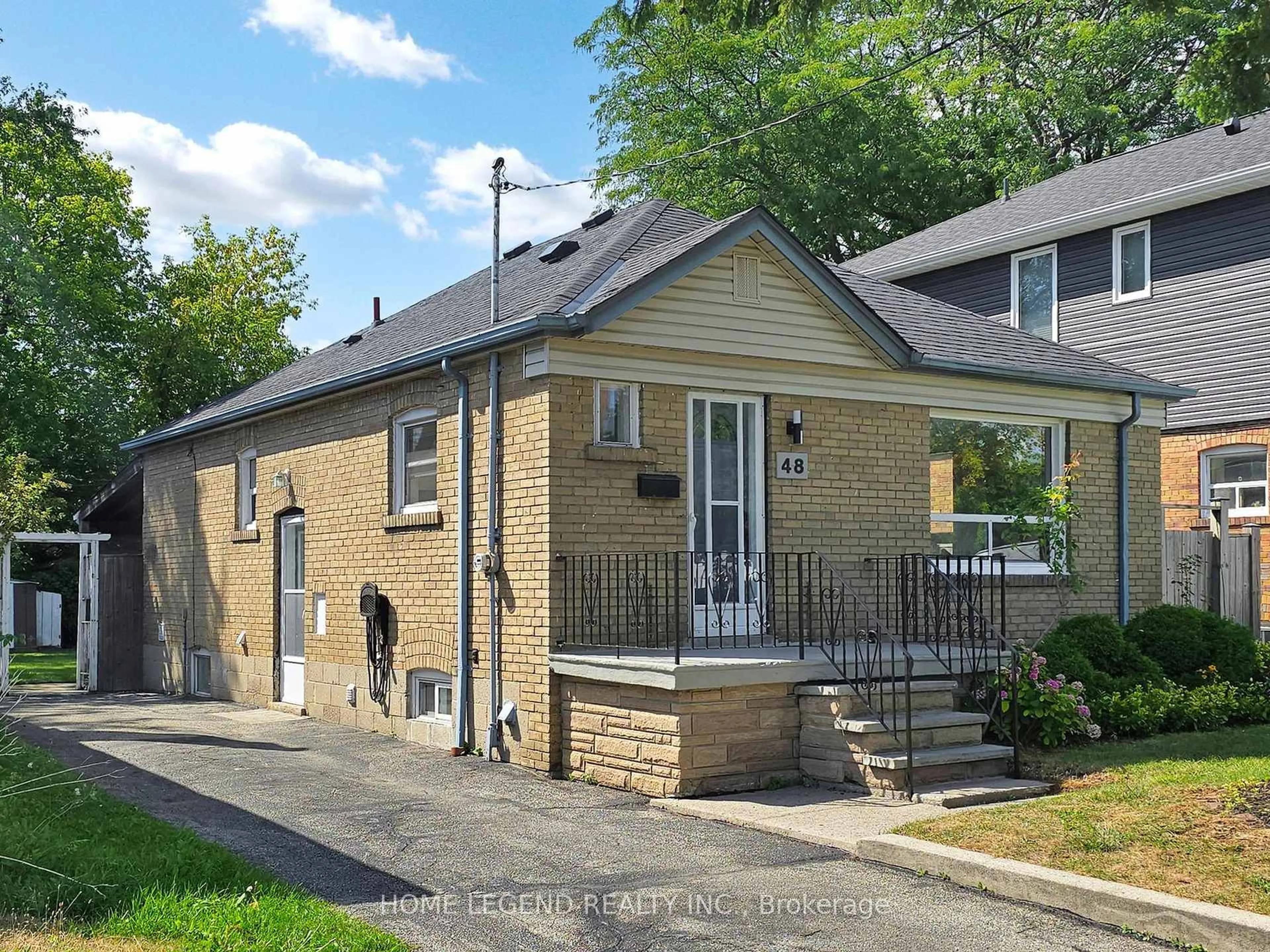 Home with brick exterior material, street for 48 Ainsdale Rd, Toronto Ontario M1R 3Z2
