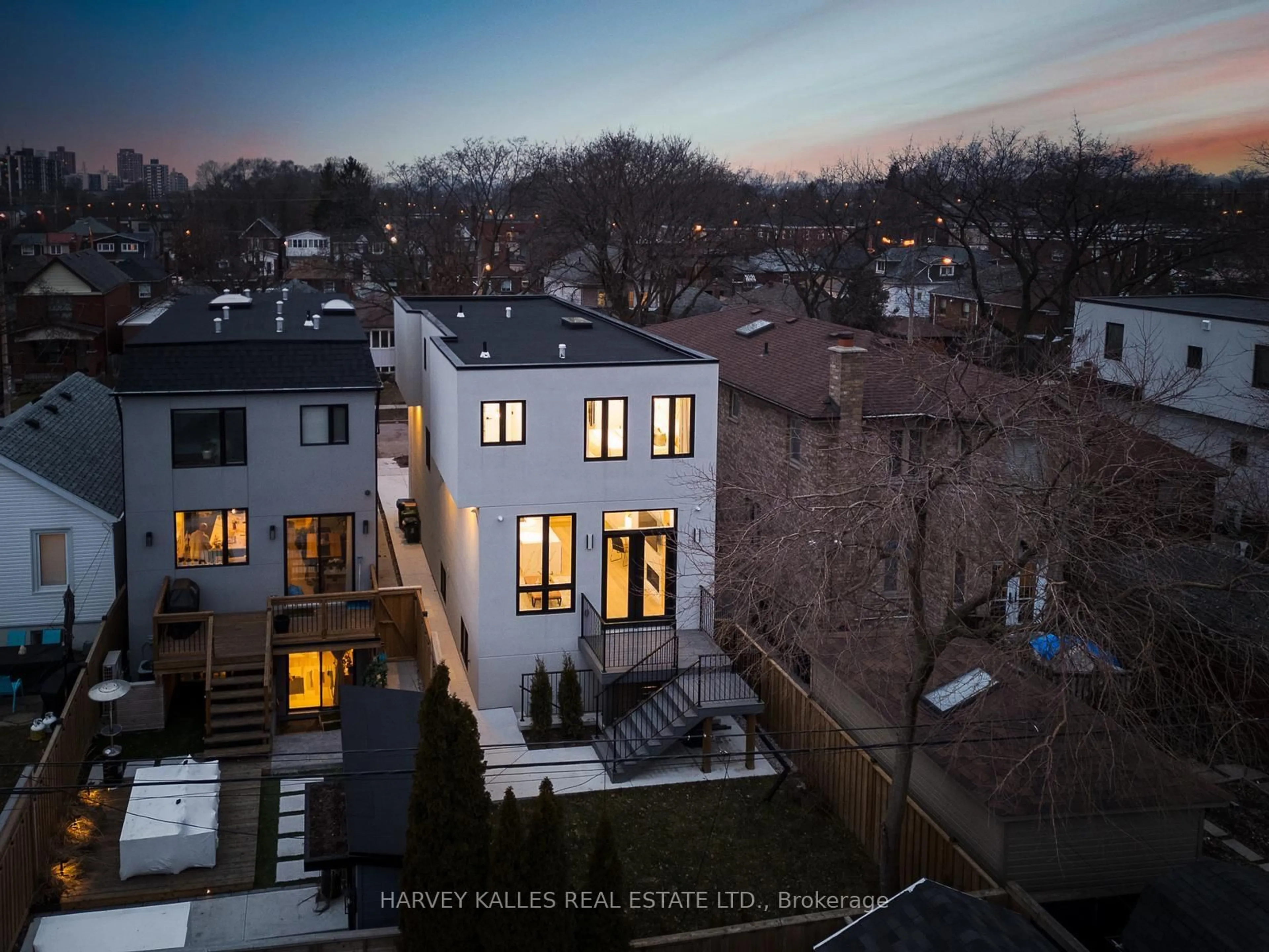 A pic from outside/outdoor area/front of a property/back of a property/a pic from drone, city buildings view from balcony for 67 Lesmount Ave, Toronto Ontario M4J 3V7