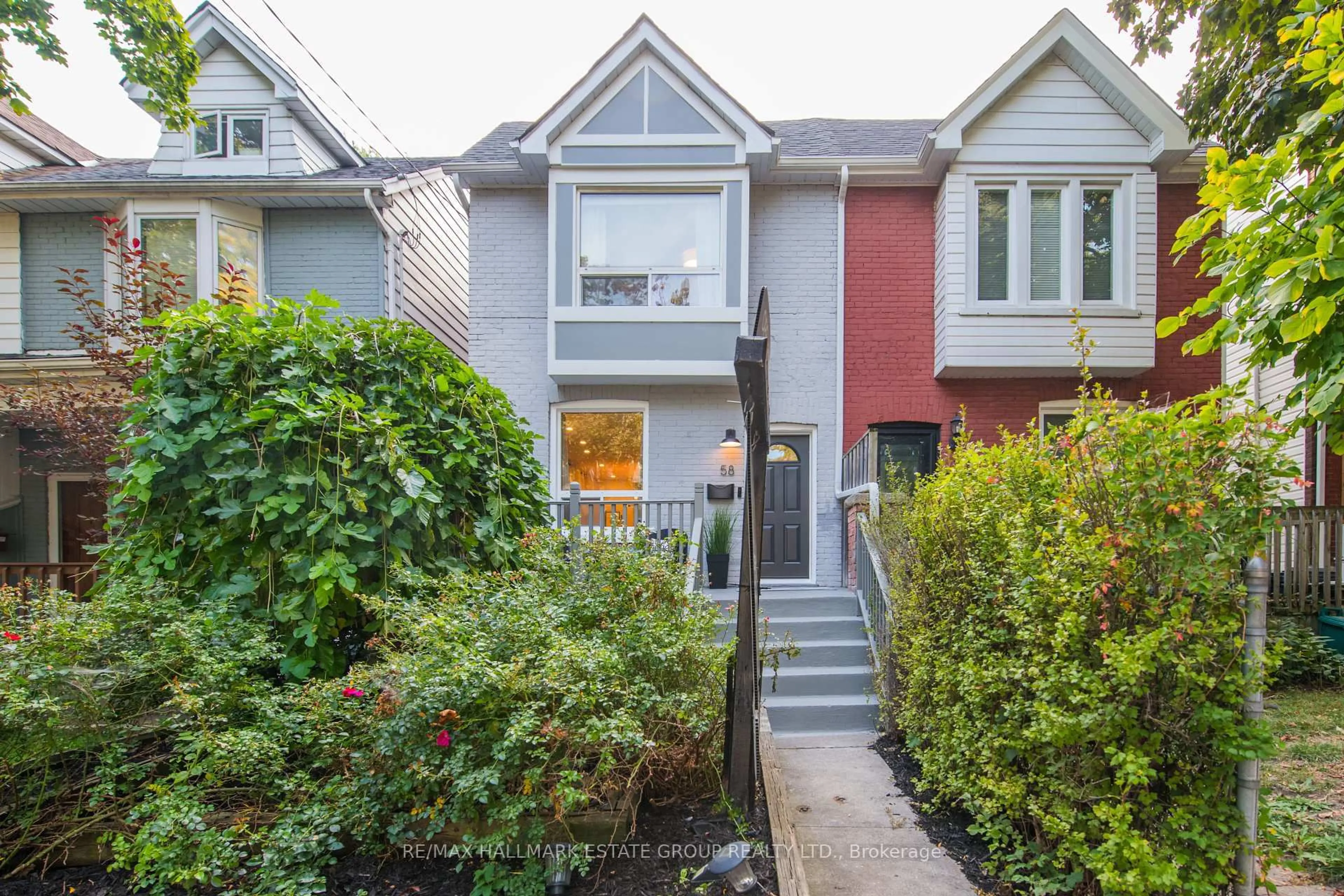 Home with vinyl exterior material, street for 58 Marjory Ave, Toronto Ontario M4M 2Y4