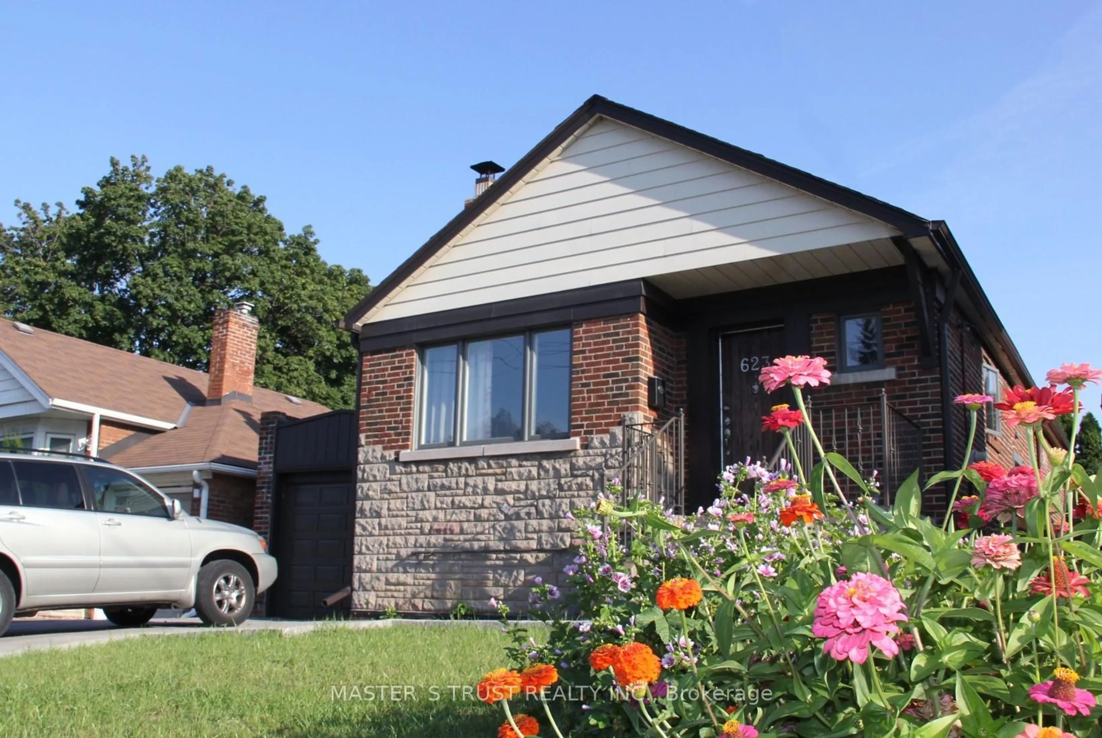 Home with brick exterior material, street for 623 O' Connor Dr Dr, Toronto Ontario M4C 3A5