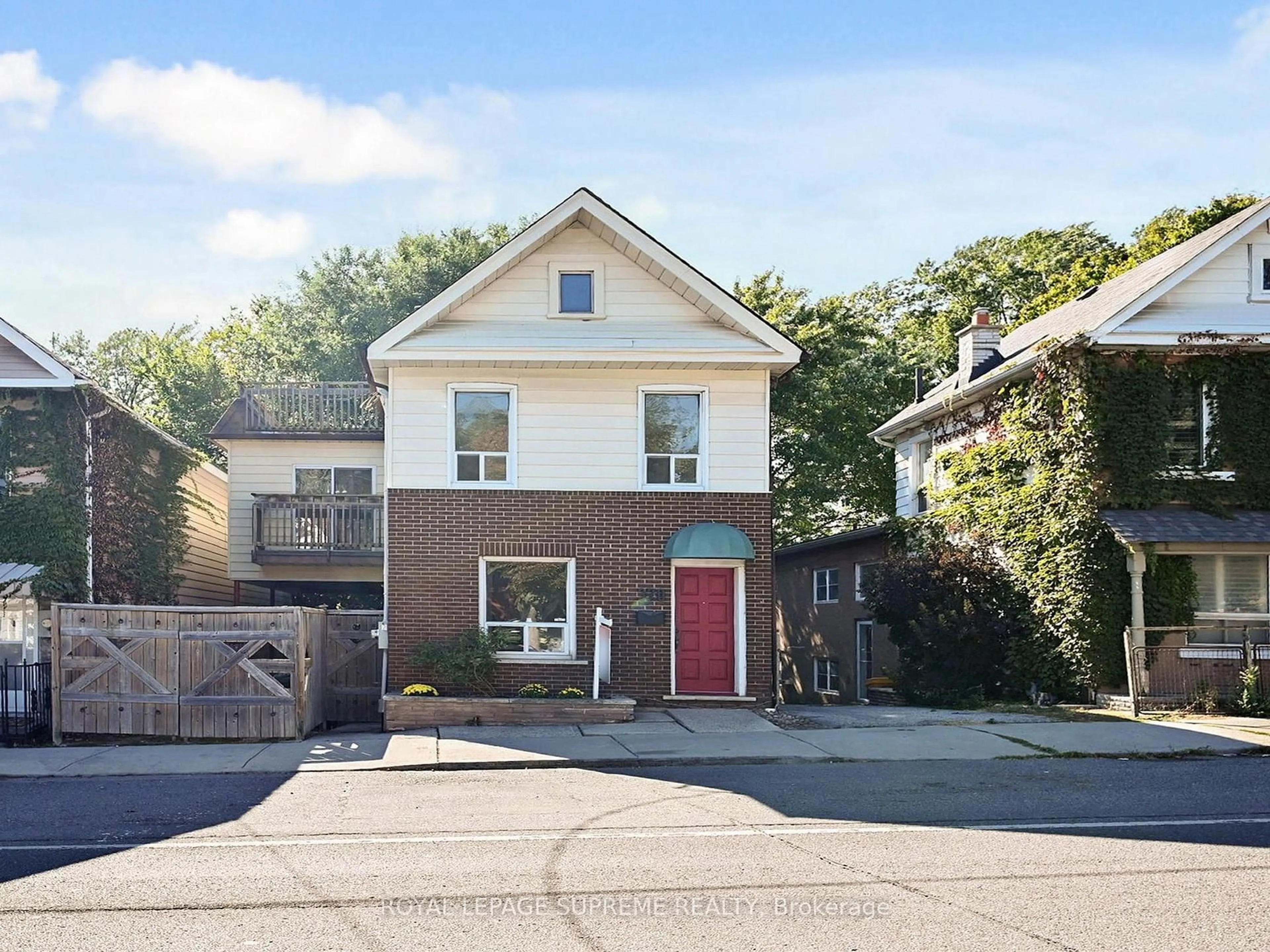 Home with brick exterior material, street for 370 Jones Ave, Toronto Ontario M4J 3G3