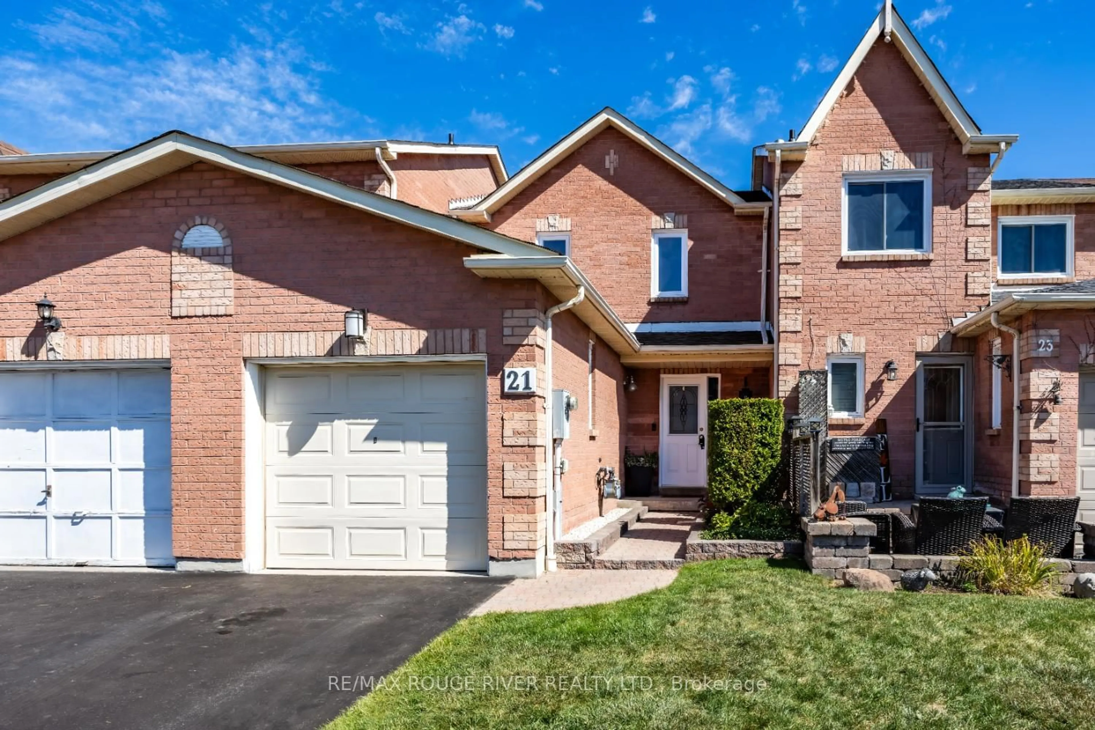 Home with brick exterior material, street for 21 Raine Dr, Ajax Ontario L1T 3L6