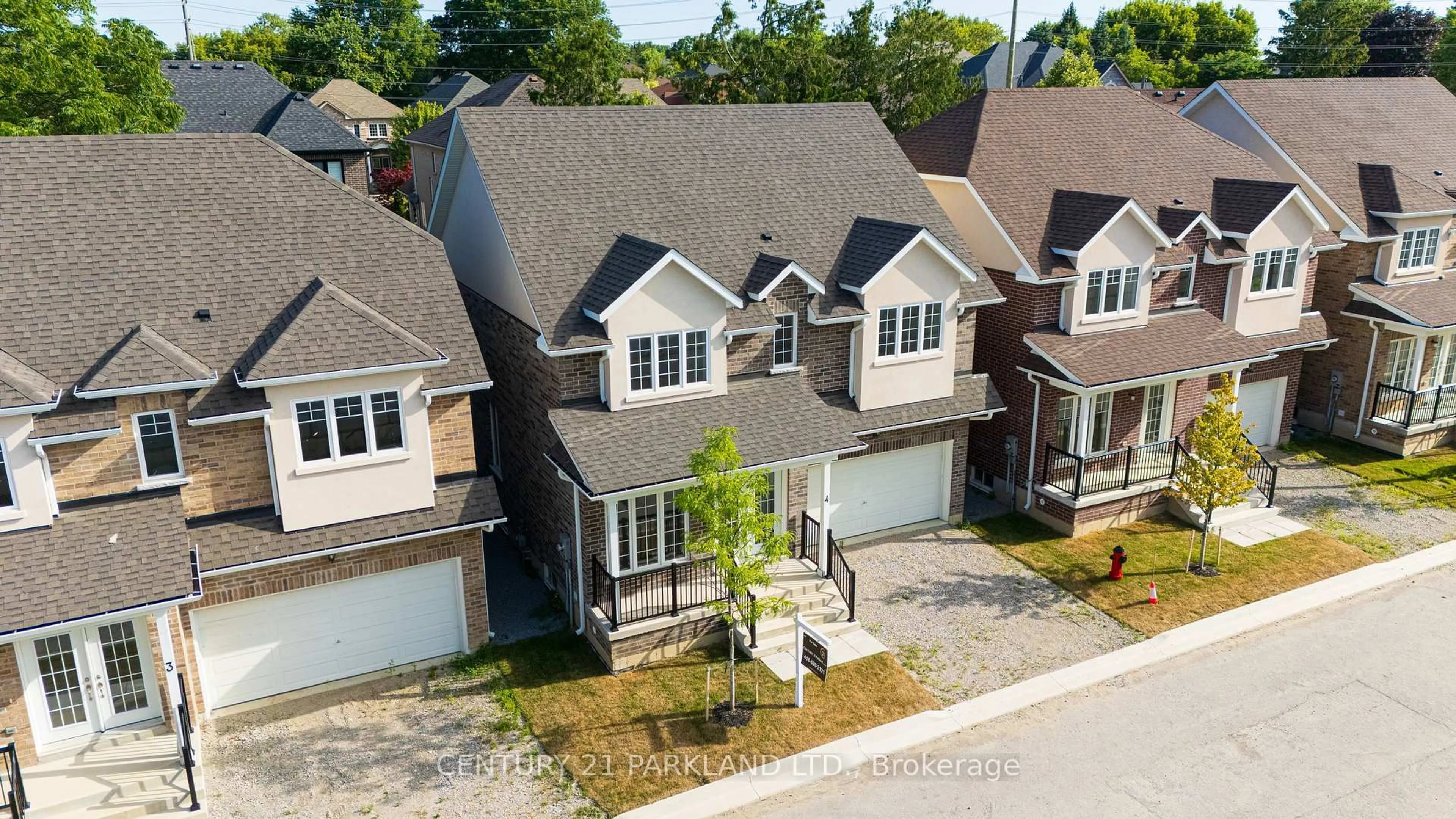A pic from outside/outdoor area/front of a property/back of a property/a pic from drone, street for 1741 Fairport Rd #POTL #2, Pickering Ontario L1V 1S9