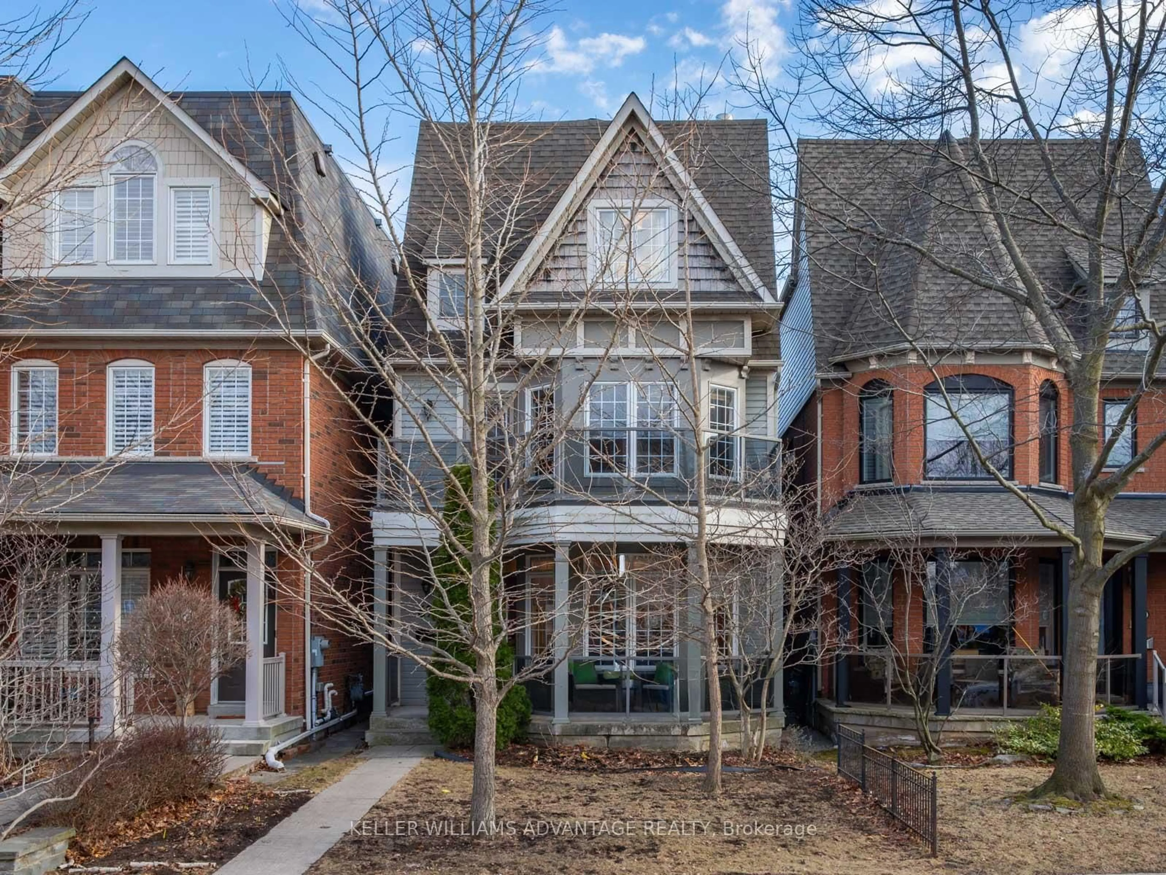 Home with brick exterior material, street for 69 Boardwalk Dr, Toronto Ontario M4L 3Z4