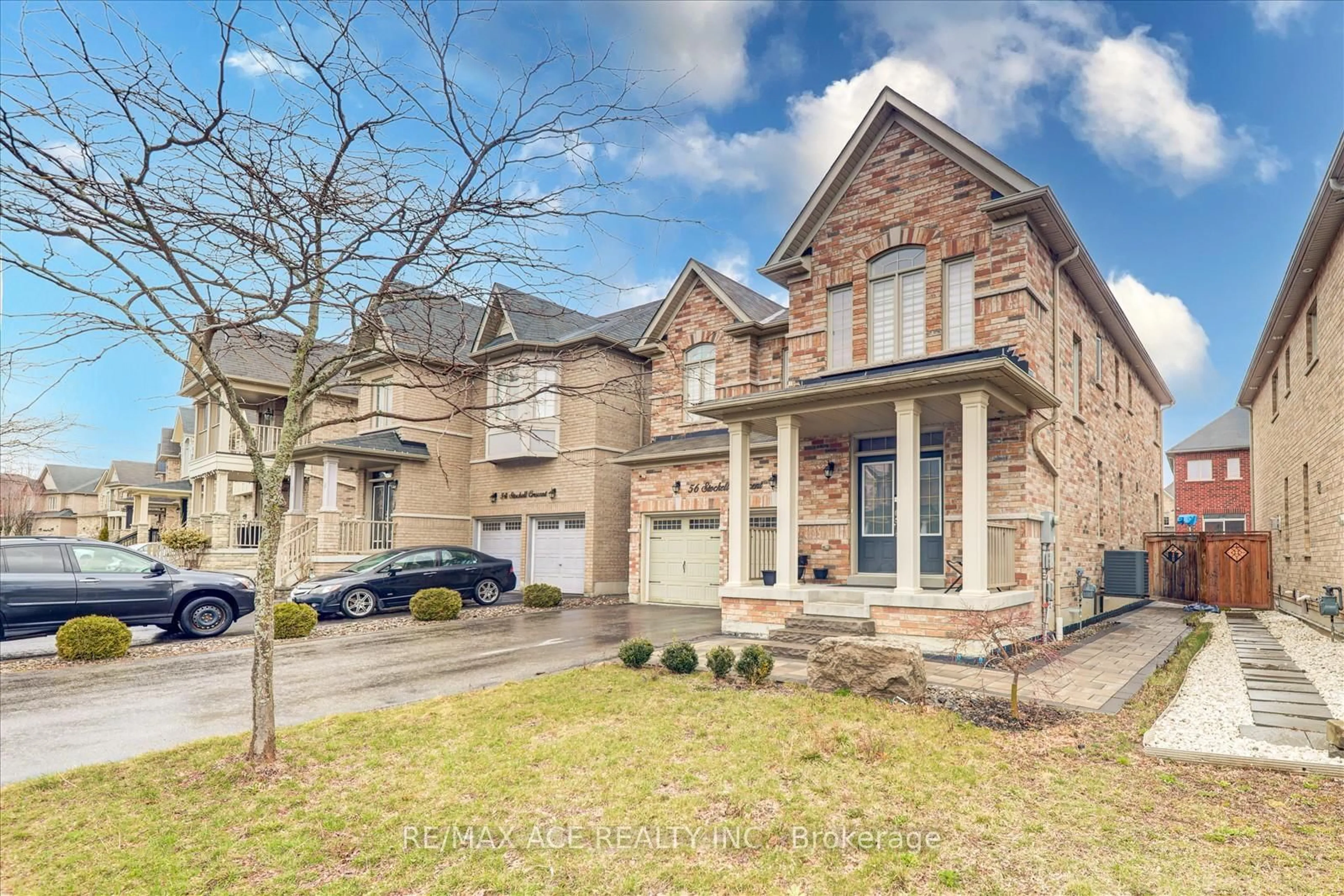 Home with brick exterior material, street for 56 Stockell Cres, Ajax Ontario L1T 0M4
