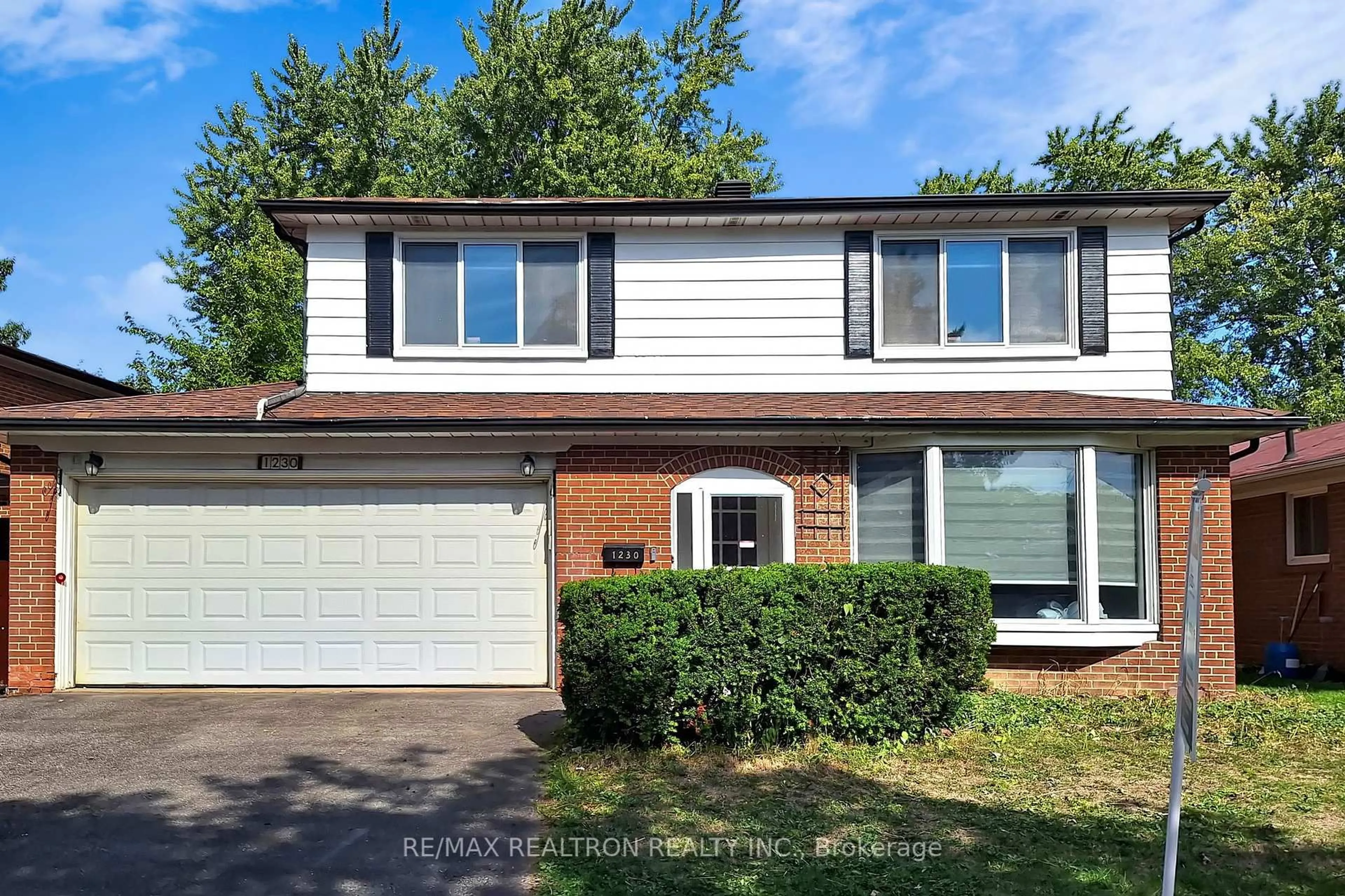 Home with vinyl exterior material, street for 1230 Huntingwood Dr, Toronto Ontario M1S 1K8