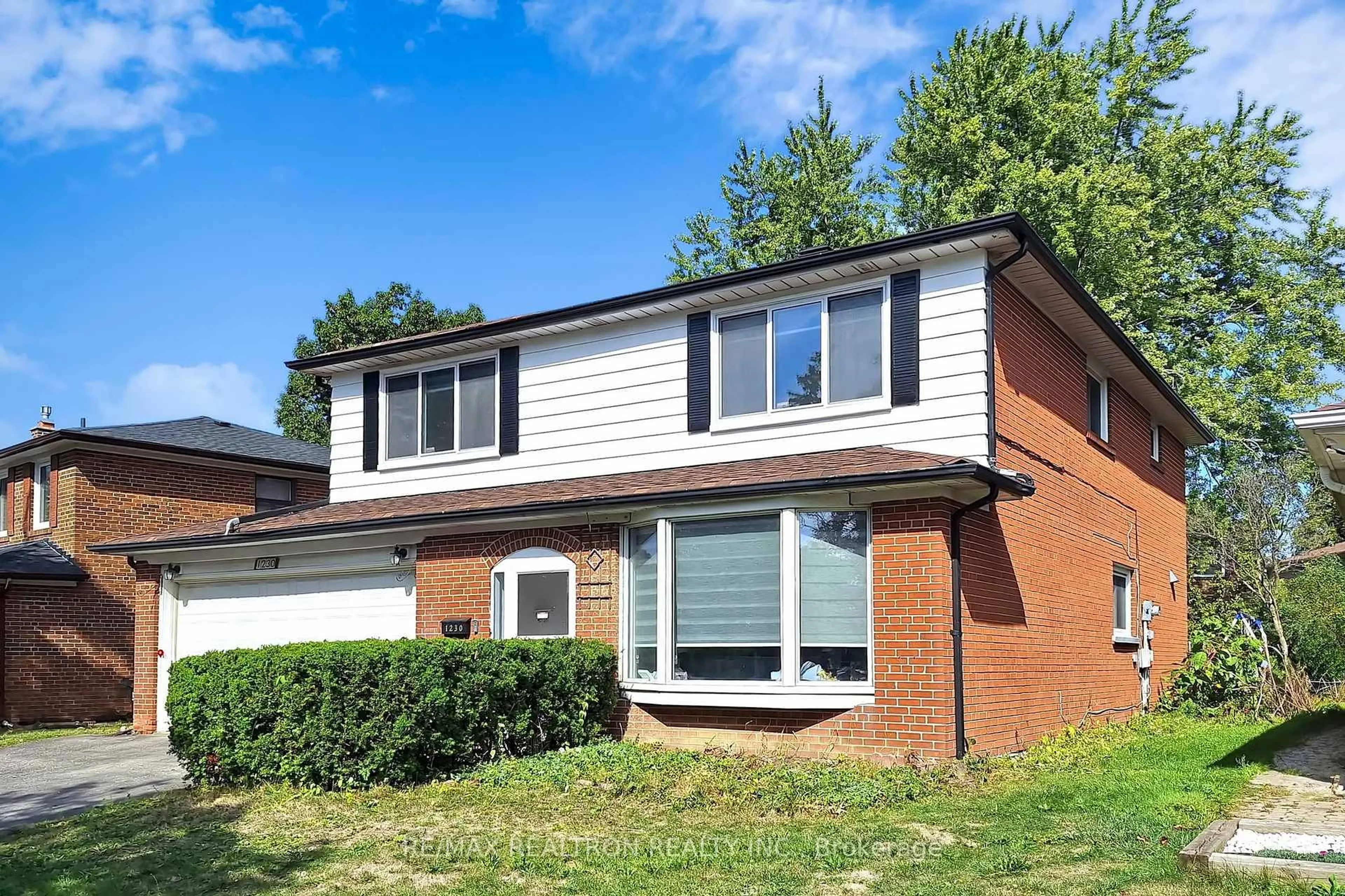 Home with brick exterior material, street for 1230 Huntingwood Dr, Toronto Ontario M1S 1K8