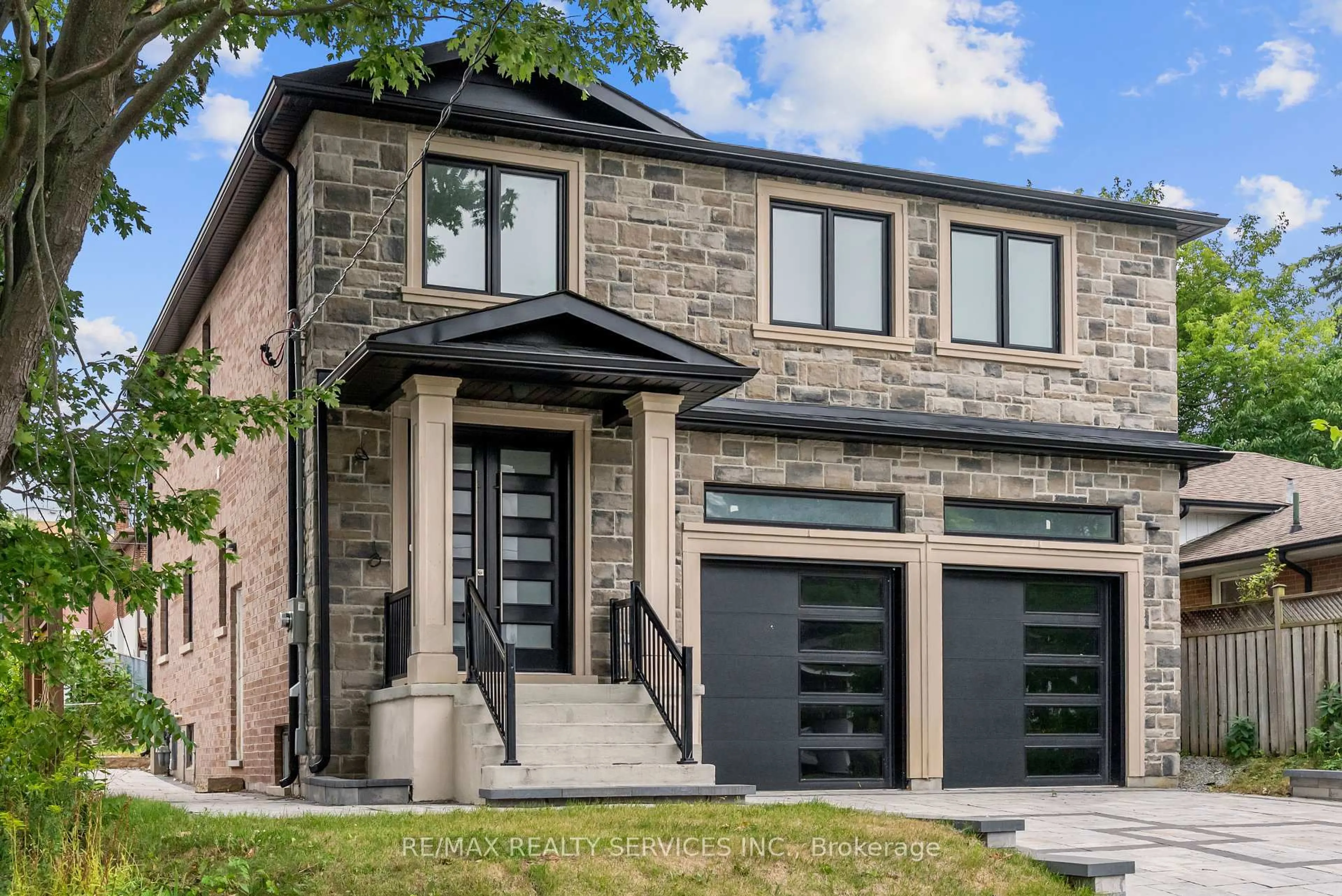 Home with brick exterior material, street for 49 Greendowns Dr, Toronto Ontario M1M 2G6
