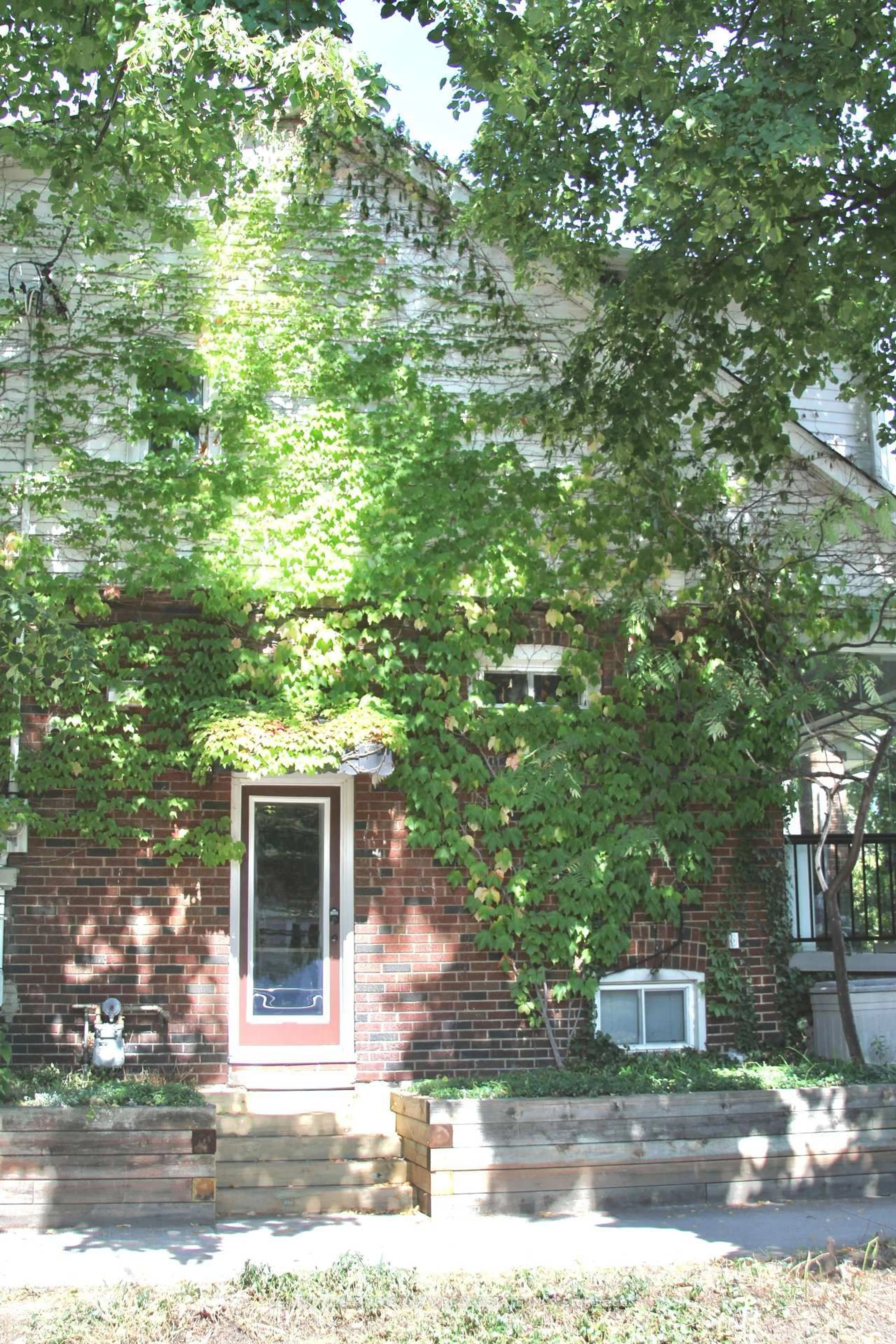 Home with brick exterior material, street for 24 Woodmount Ave, Toronto Ontario M4C 3X7