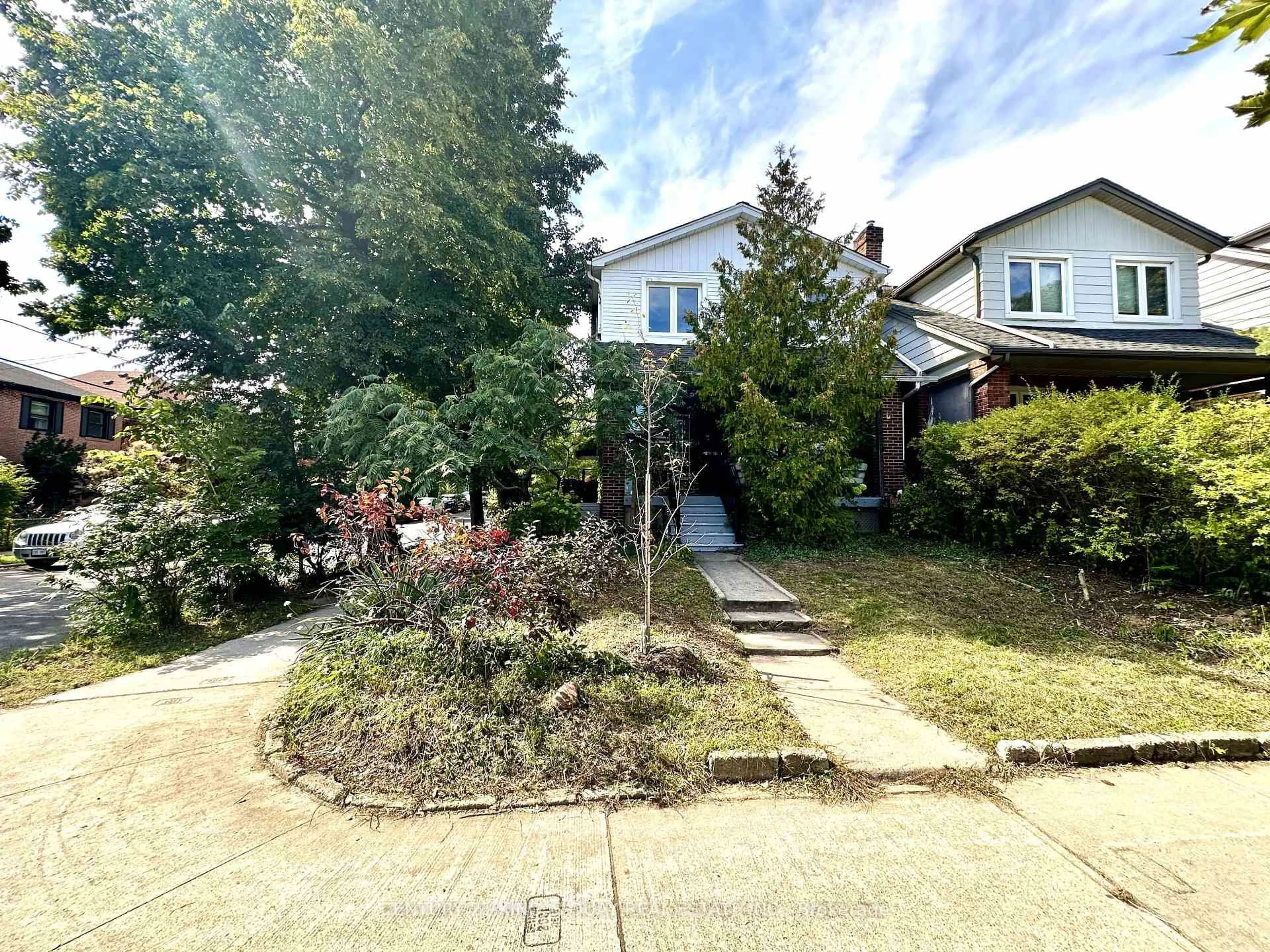A pic from outside/outdoor area/front of a property/back of a property/a pic from drone, street for 24 Woodmount Ave, Toronto Ontario M4C 3X7