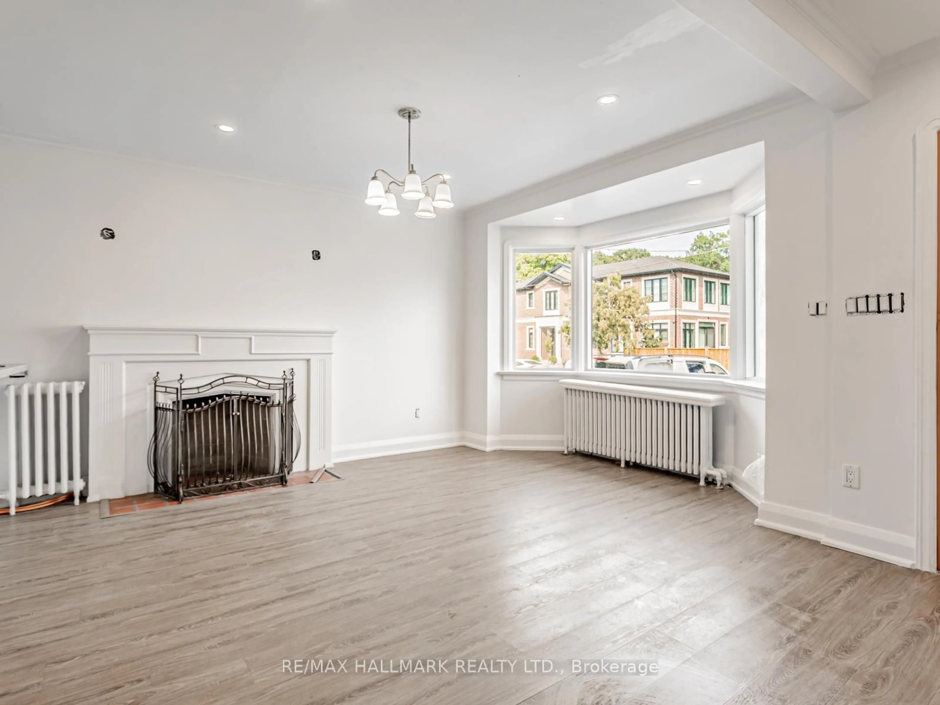 Living room with furniture, unknown for 12 Ralston Ave, Toronto Ontario M4C 3L5