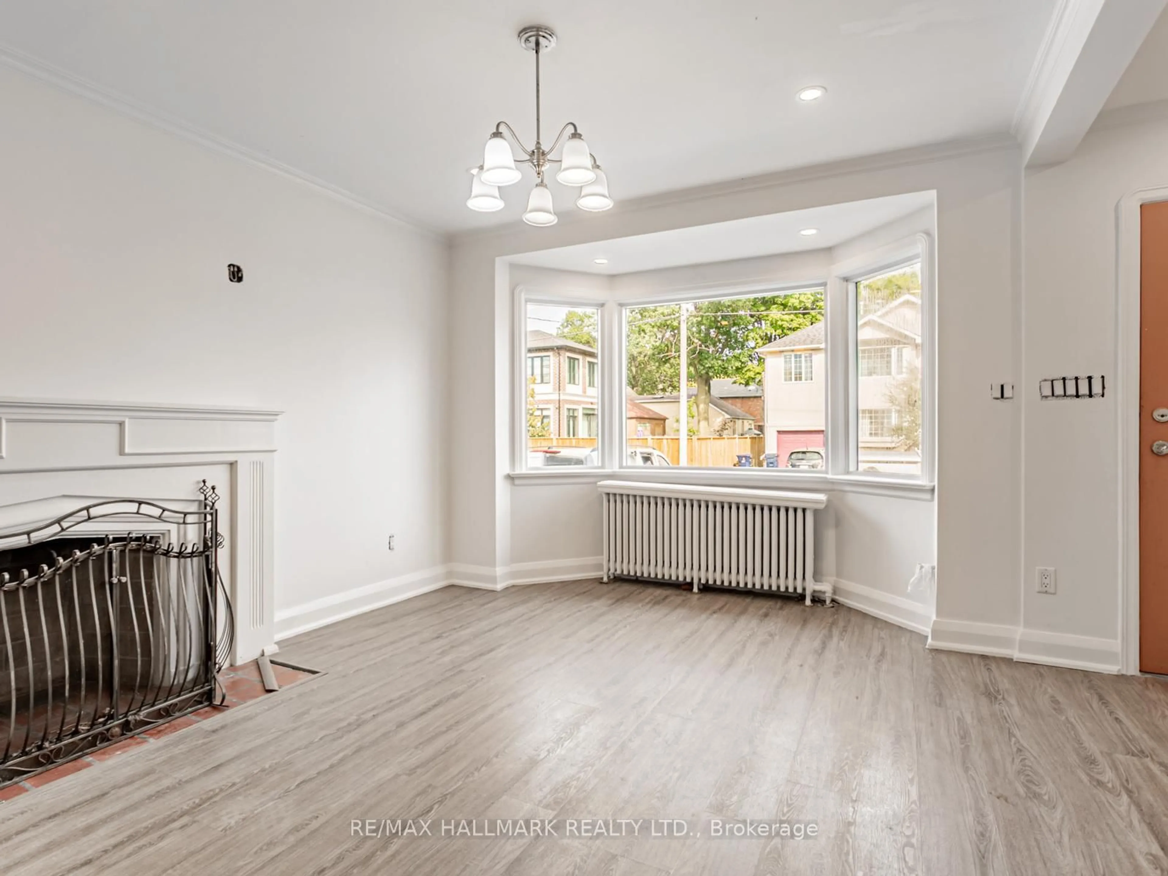 Living room with furniture, unknown for 12 Ralston Ave, Toronto Ontario M4C 3L5