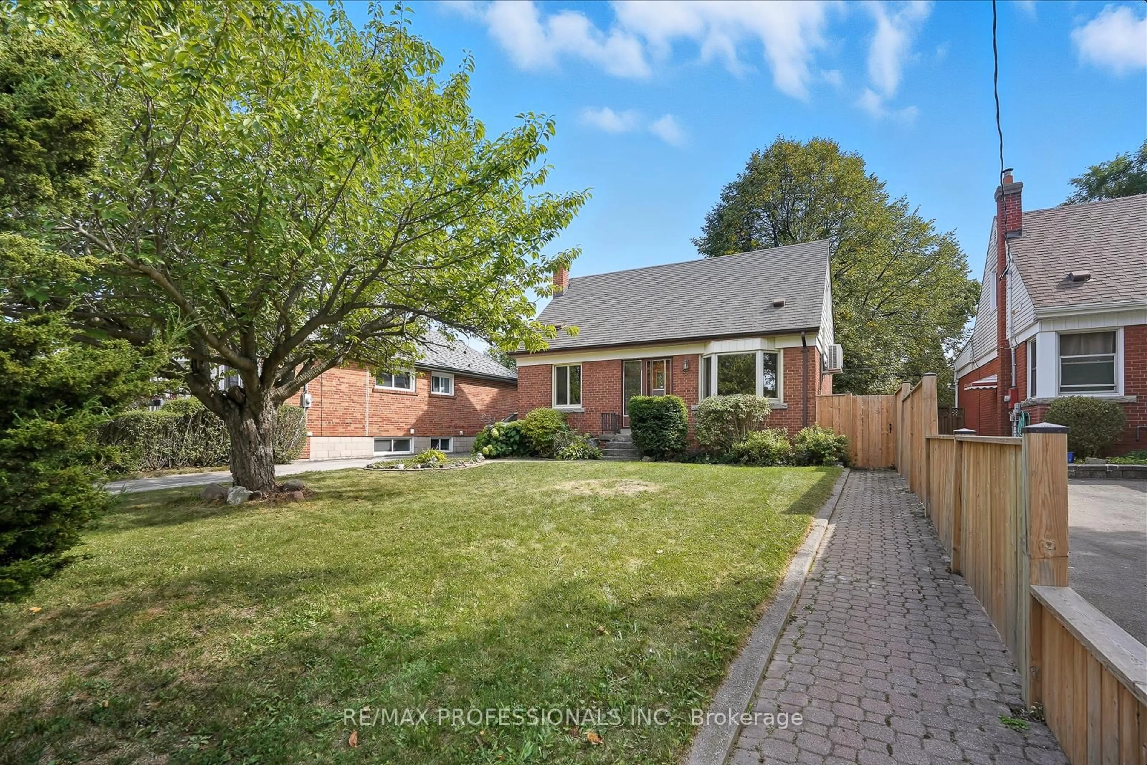 Home with brick exterior material, street for 23 Scotswood Rd, Toronto Ontario M1R 3N3