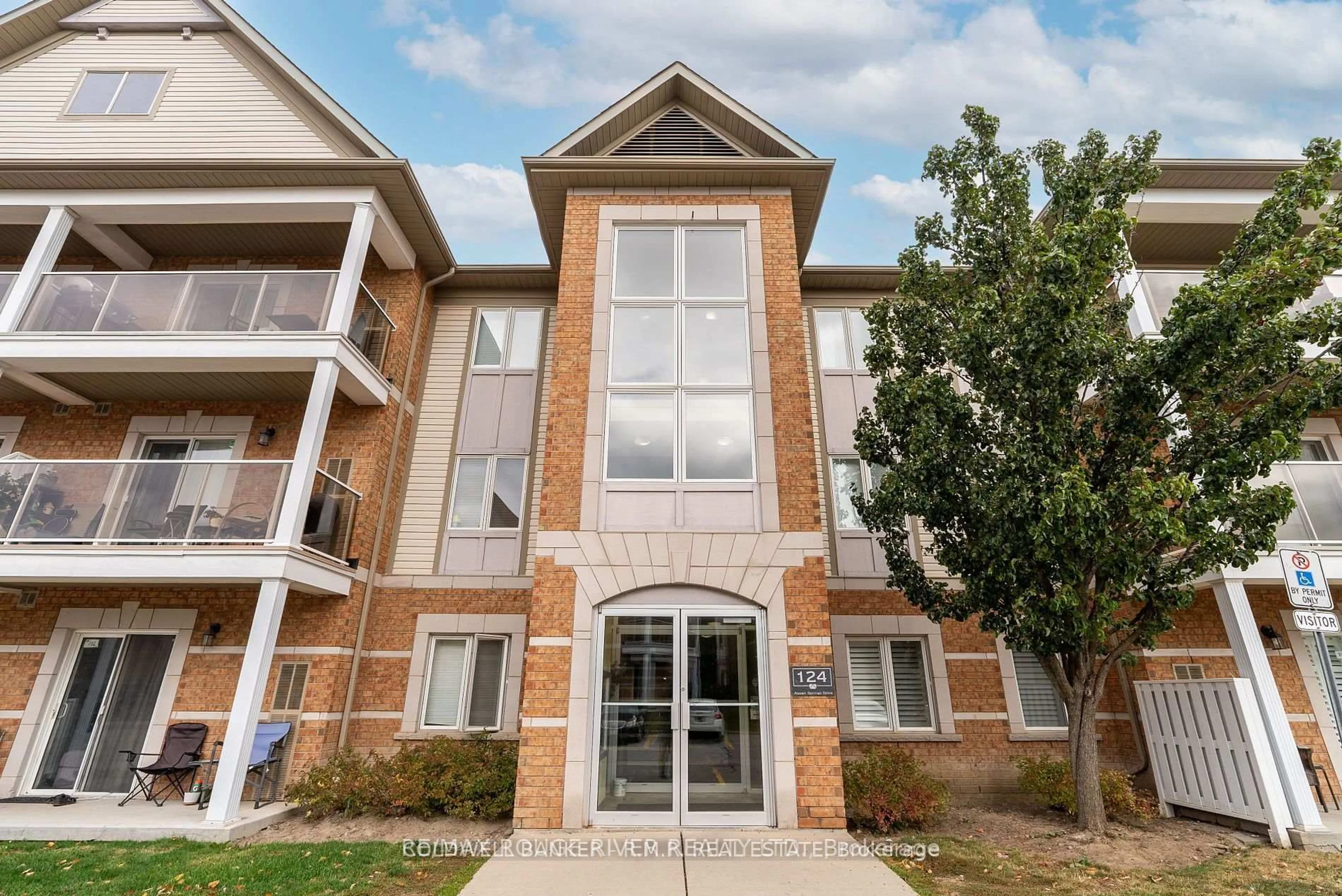 Home with brick exterior material, building for 124 Aspen Springs Dr #310, Clarington Ontario L1C 0G8
