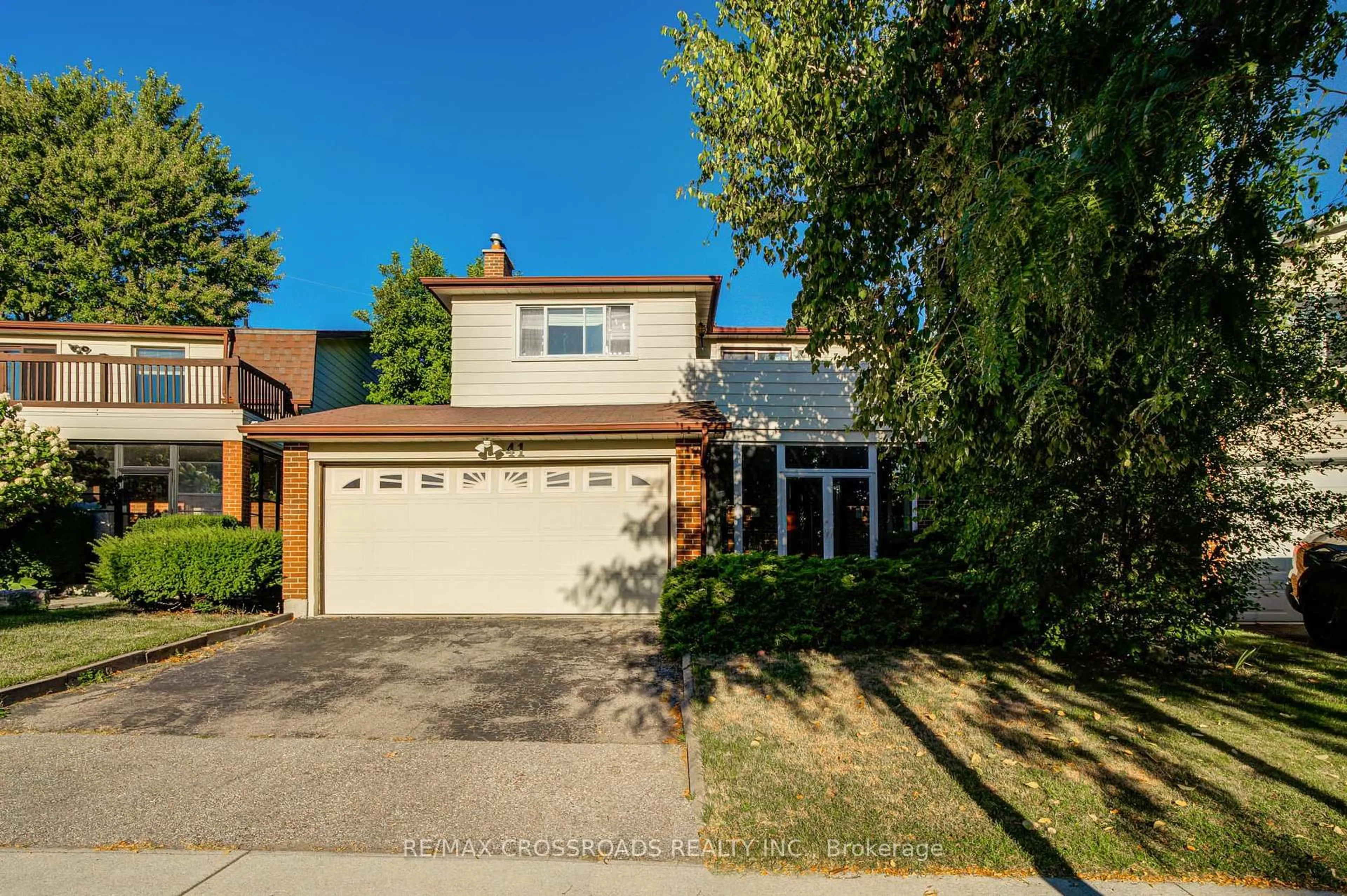 Home with brick exterior material, street for 41 Huntsmill Blvd, Toronto Ontario M1W 2Z8