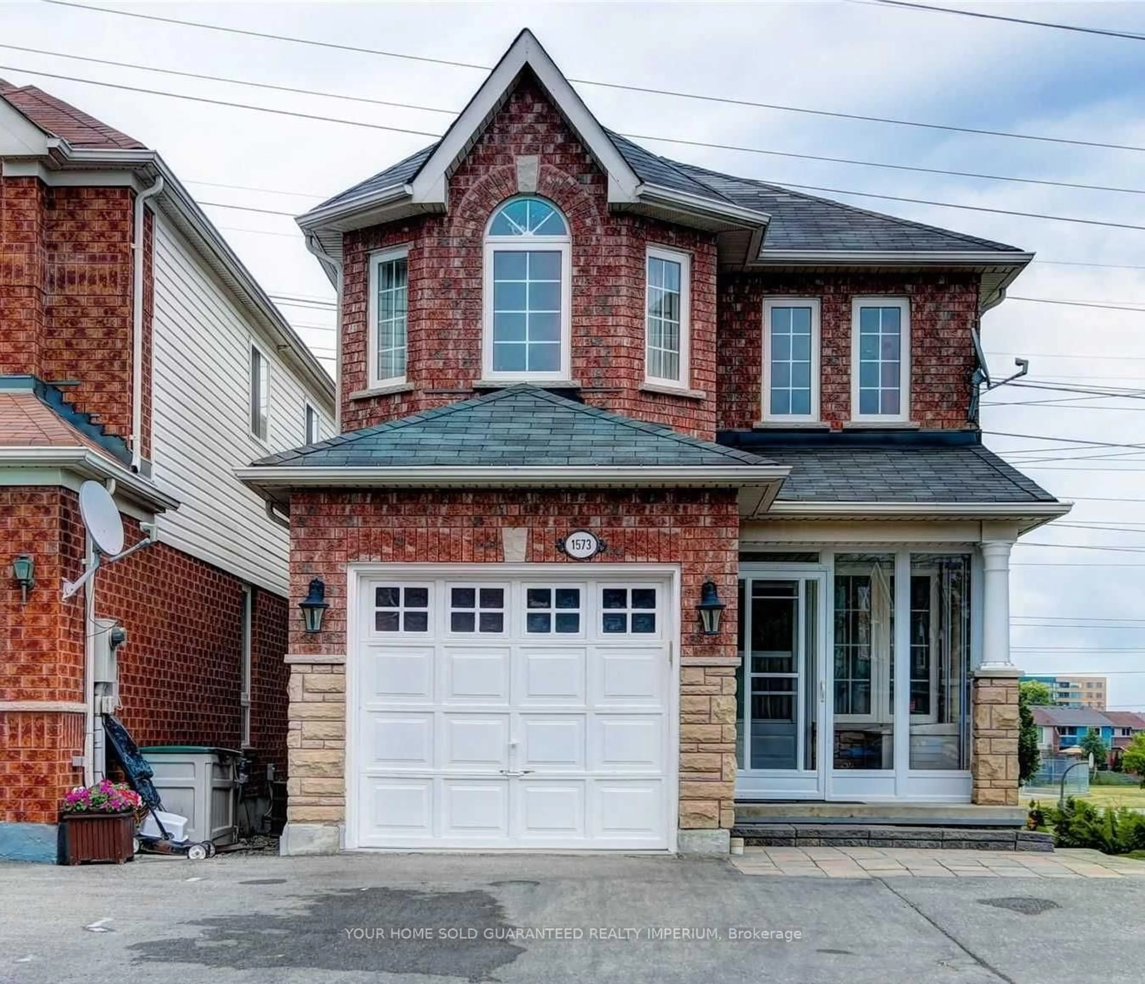 Home with brick exterior material, street for 1573 Avonmore Sq, Pickering Ontario L1V 7H5