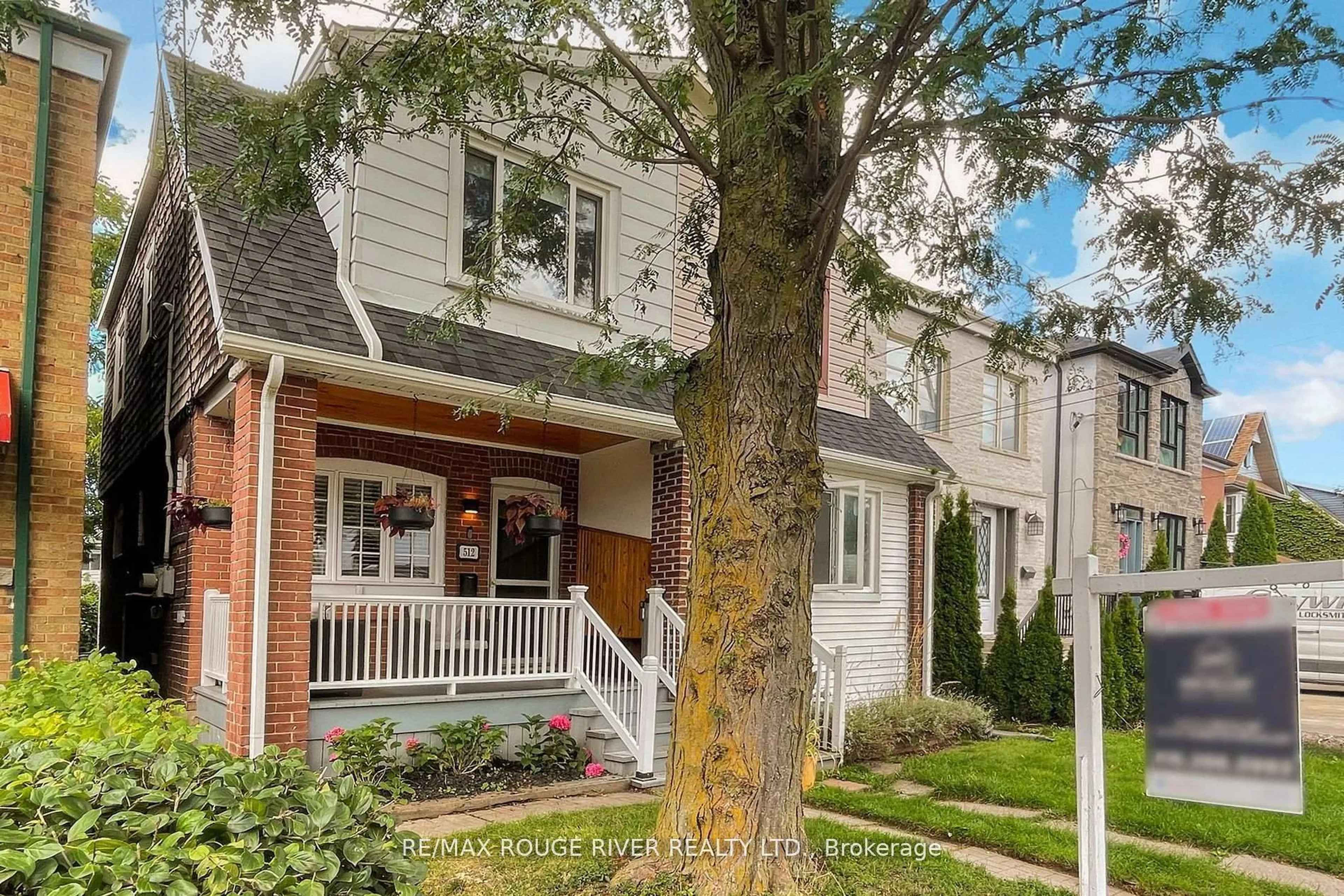 Home with brick exterior material, street for 512 Main St, Toronto Ontario M4C 4Y4