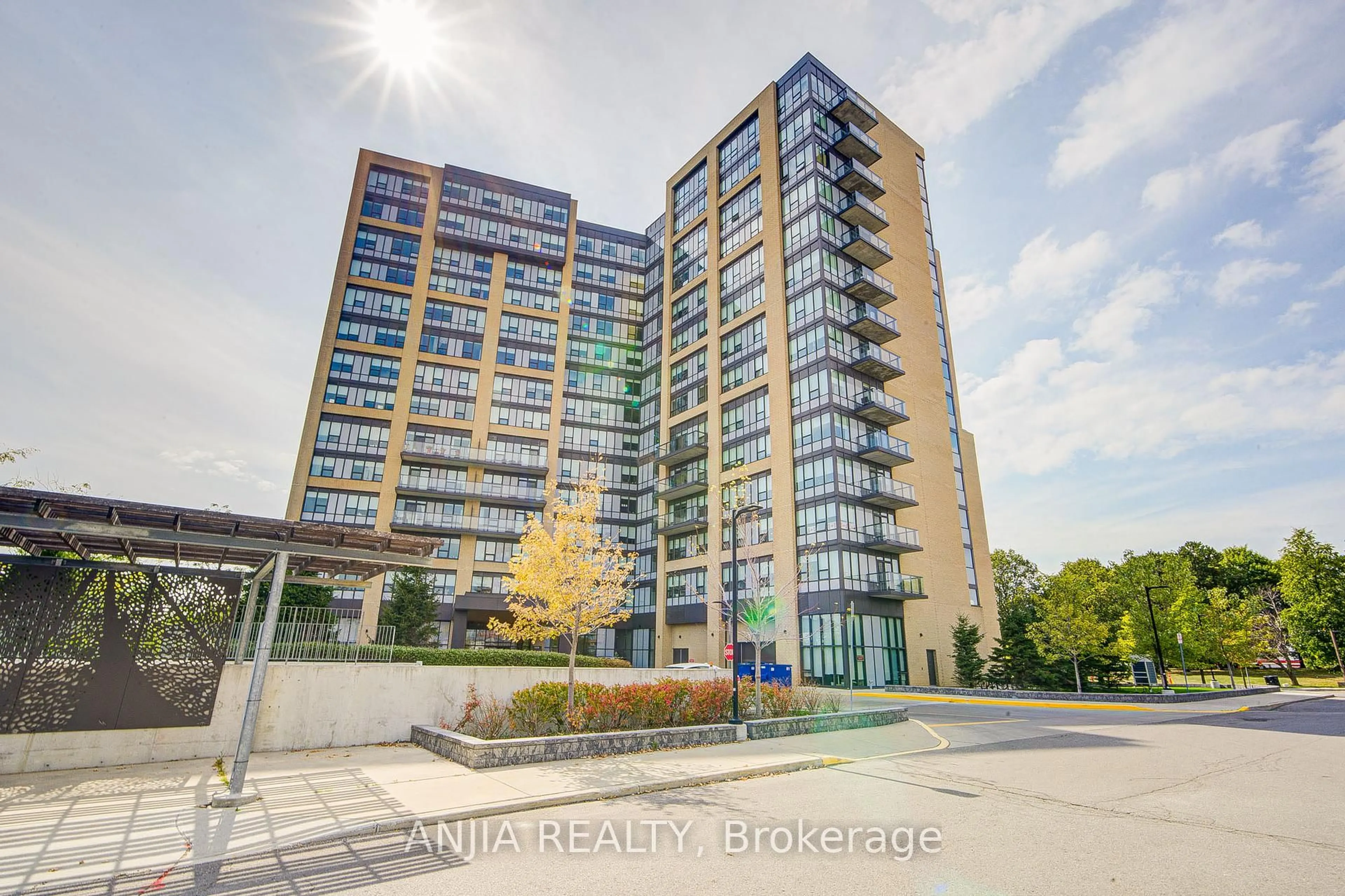 A pic from outside/outdoor area/front of a property/back of a property/a pic from drone, building for 1028 McNicoll Ave #1213, Toronto Ontario M1W 0B5