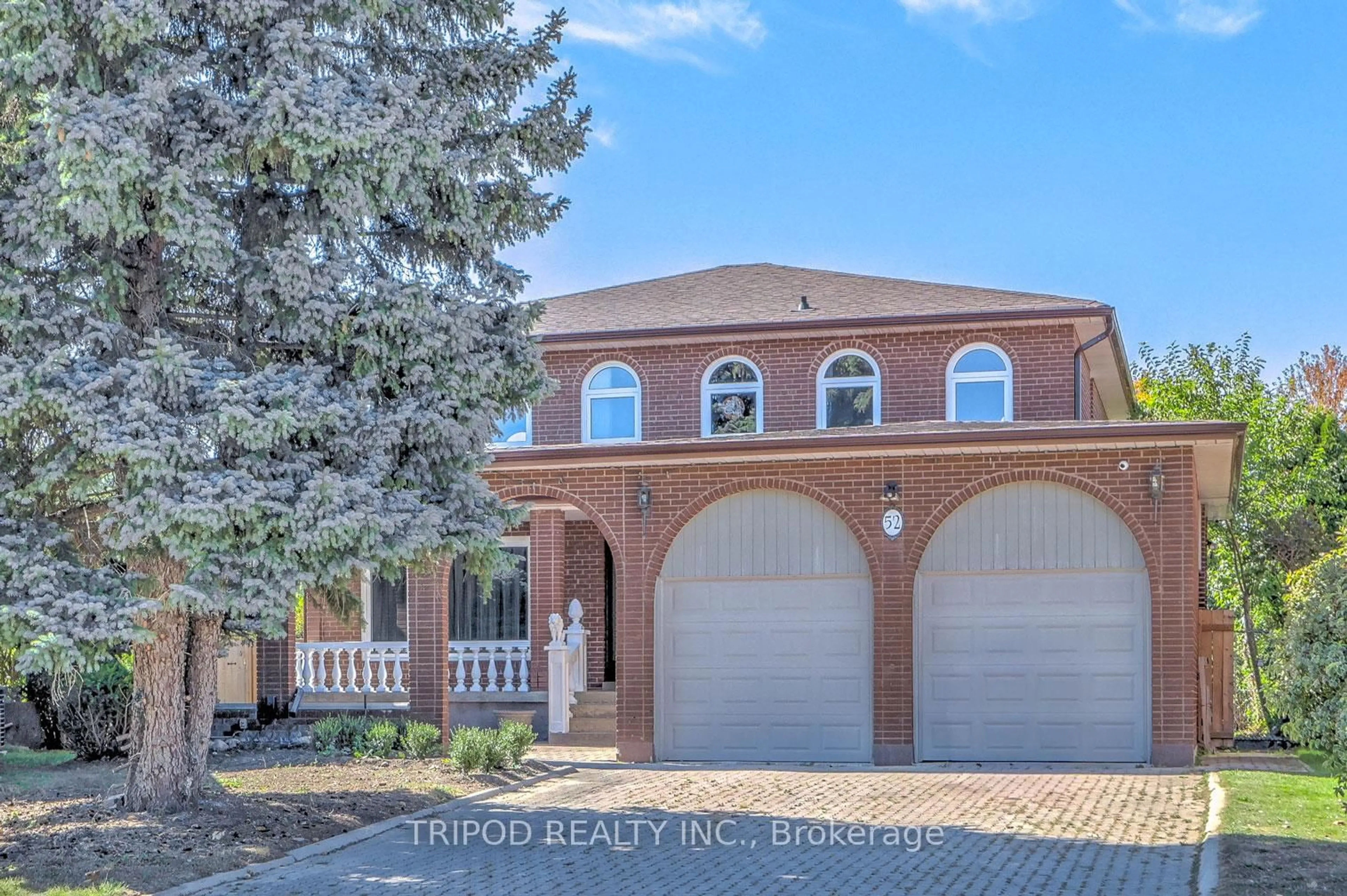Home with brick exterior material, street for 52 Triangle Villas Dr, Toronto Ontario M1W 3L2